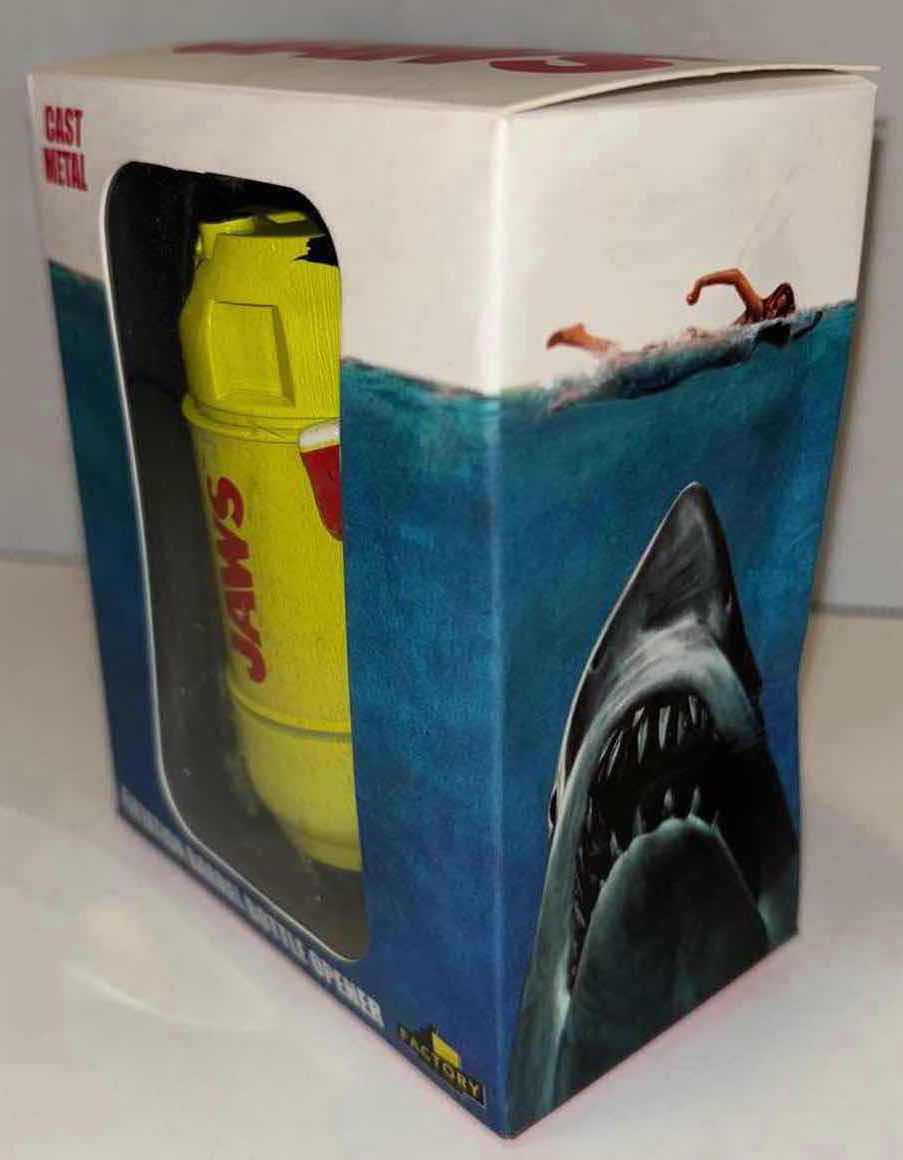 Photo 1 of NEW FACTORY ENTERTAINMENT JAWS CAST METAL FLOTATION BARREL BOTTLE OPENER