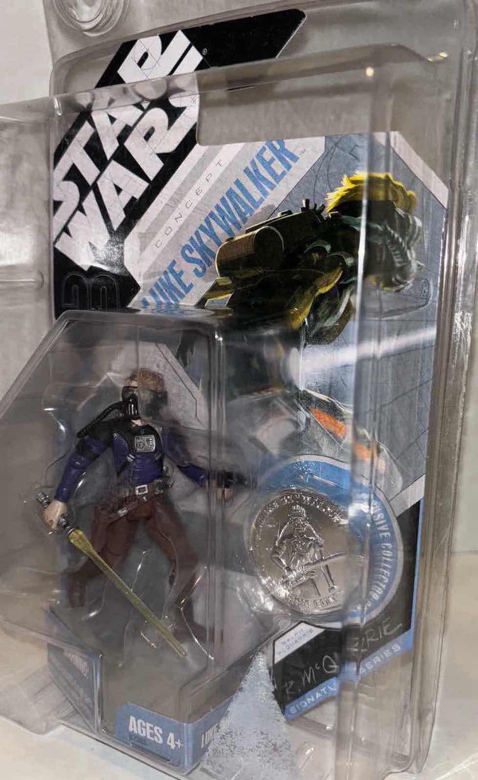 Photo 1 of NEW HASBRO 2007 STAR WARS 30TH ANNIVERSARY RALPH MCQUARRIE SIGNATURE SERIES ACTION FIGURE & ACCESSORIES W EXCLUSIVE COLLECTOR COIN, “CONCEPT LUKE SKYWALKER” IN CLEAR CLAMSHELL CASE