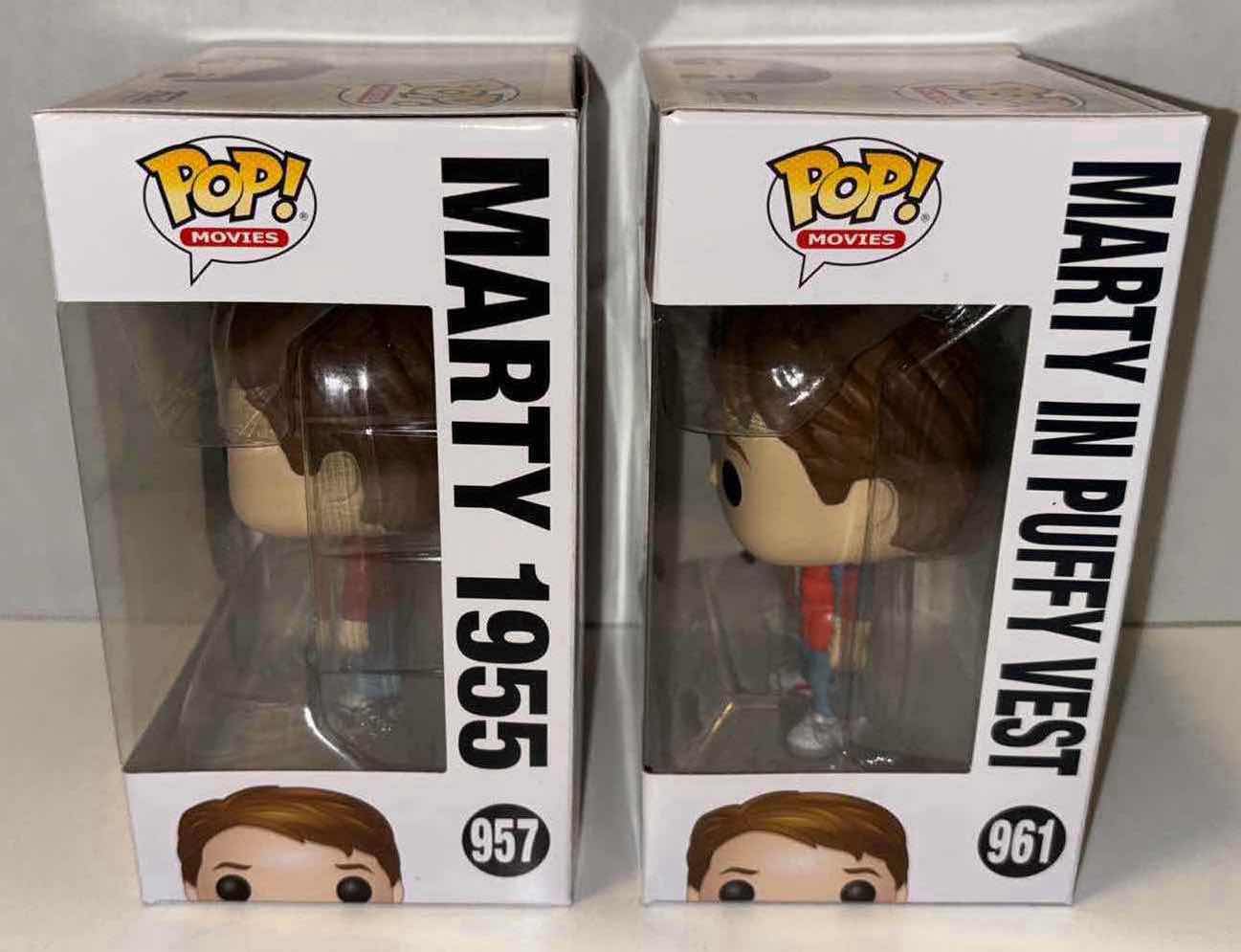 Photo 1 of NEW FUNKO POP! MOVIES VINYL FIGURE, 2-PACK BACK TO THE FUTURE #957 MARTY 1955 & #961 MARTY IN PUFFY VEST