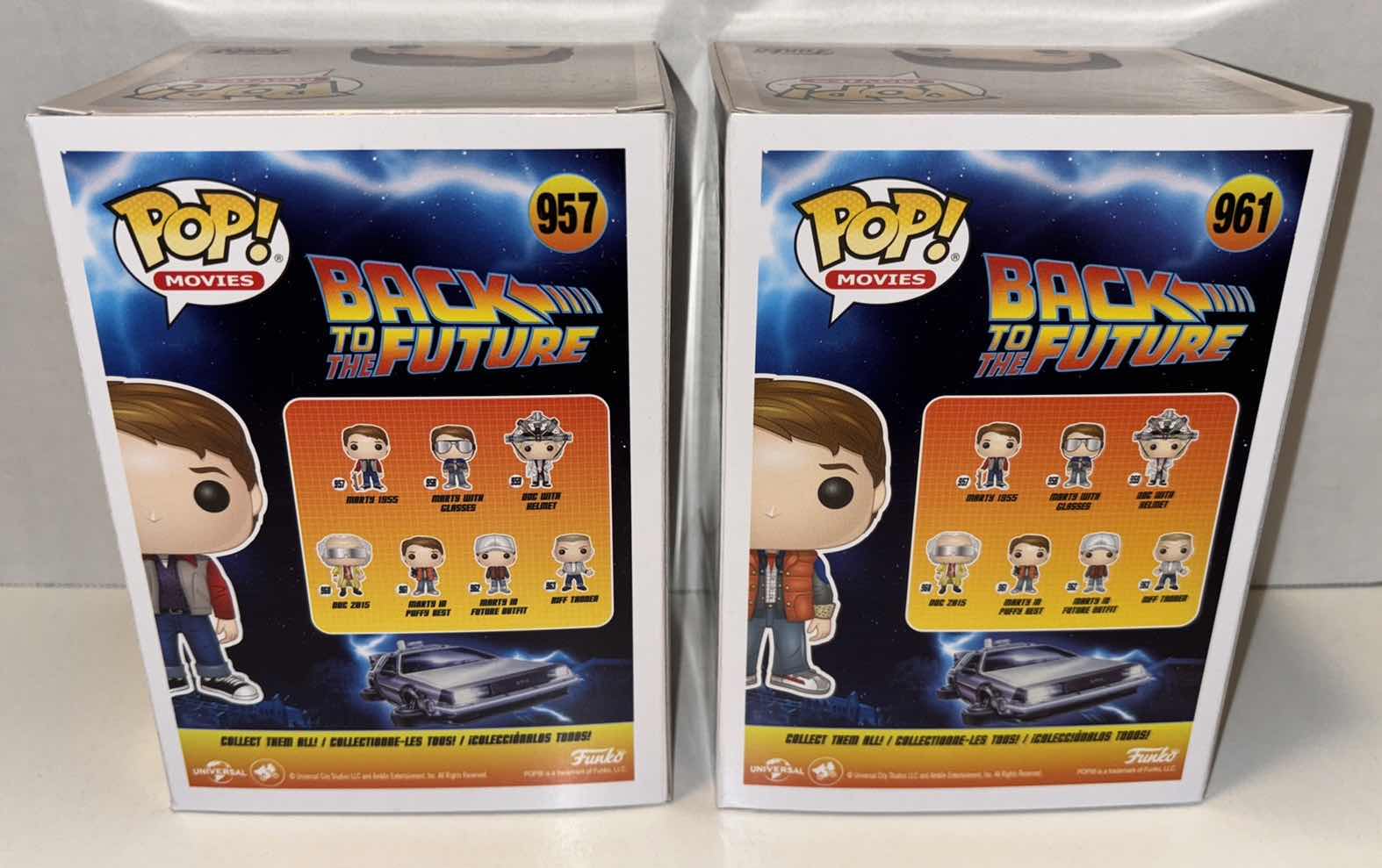 Photo 1 of NEW FUNKO POP! MOVIES VINYL FIGURE, 2-PACK BACK TO THE FUTURE #957 MARTY 1955 & #961 MARTY IN PUFFY VEST