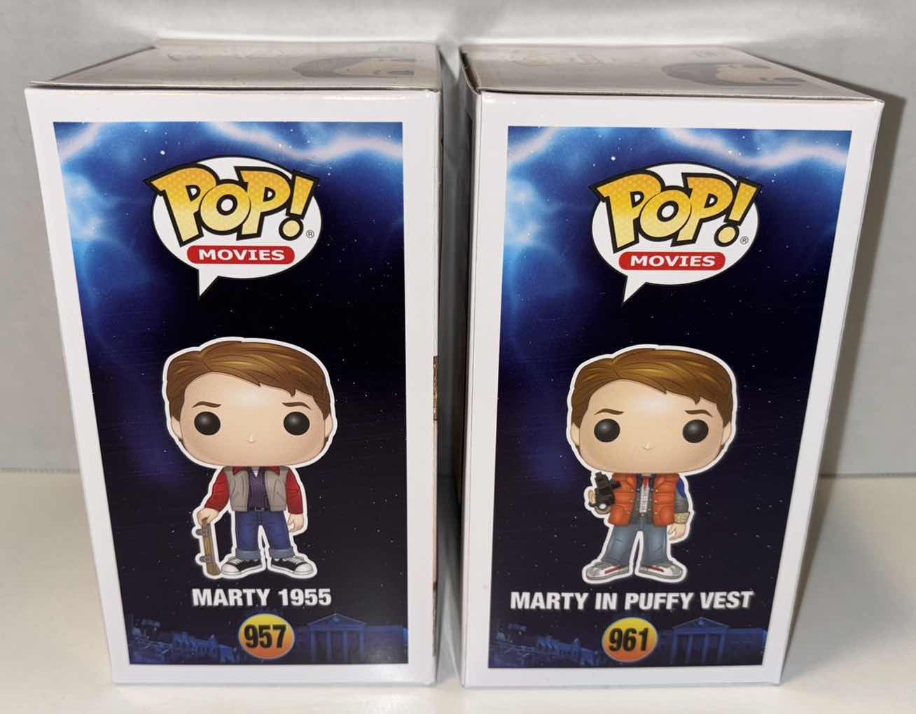 Photo 1 of NEW FUNKO POP! MOVIES VINYL FIGURE, 2-PACK BACK TO THE FUTURE #957 MARTY 1955 & #961 MARTY IN PUFFY VEST