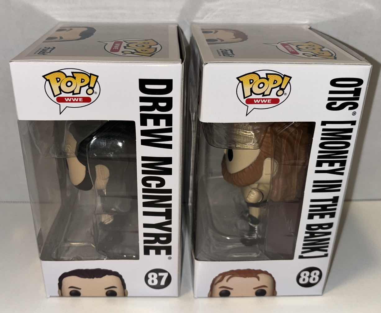 Photo 1 of NEW FUNKO POP! WWE VINYL FIGURE, 2-PACK #87 DREW MCINTYRE & #88 OTIS (MONEY IN THE BANK)