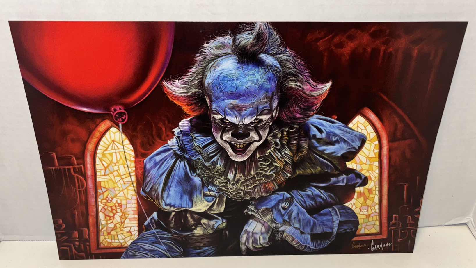 Photo 1 of VICTOR GARDUNO “YOU’LL FLOAT TOO” 11” X 17” INFINITY GLOSS UNFRAMED PRINT W EMBOSSED SEAL, DIGITAL SIGNATURE & OFFICIAL SIGNATURE W COA INCLUDED, STORED IN A RIGID PRINT PROTECTOR SLEEVE