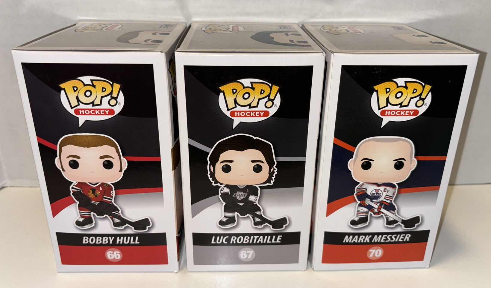 Photo 1 of NEW FUNKO POP! 3-PACK NHL HOCKEY LEGENDS VINYL FIGURES, #66 BOBBY HULL #67 LUC ROBITAILLE #70 MARK MESSIER