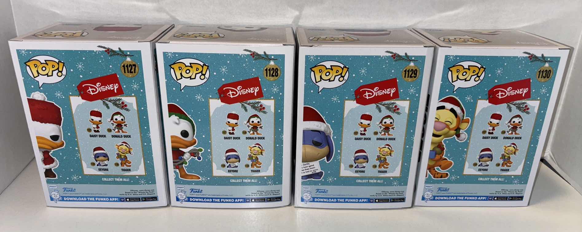 Photo 1 of NEW FUNKO POP! 4-PACK DISNEY 2021 HOLIDAY COMPLETE SET OF VINYL FIGURES, #1127 DAISY DUCK #1128 DONALD DUCK #1129 EEYORE #1130 TIGGER
