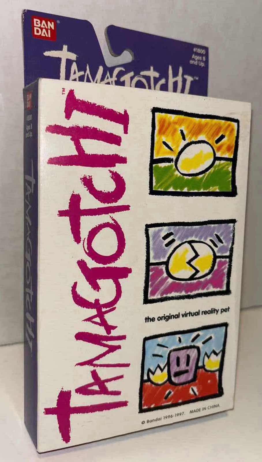 Photo 1 of NEW 1996-97 BANDAI TAMAGOTCHI THE ORIGINAL VIRTUAL REALITY PET KEYCHAIN