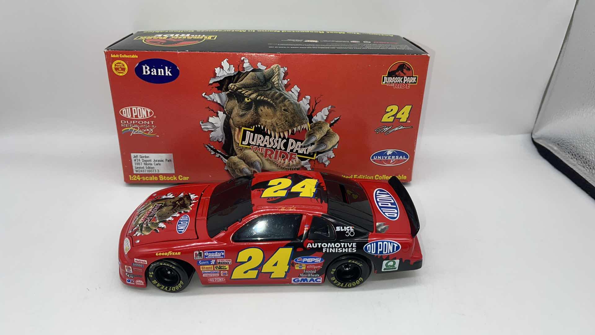 View 1 of 1997 JEFF GORDAN JURASSIC PARK DIECAST CAR 1:24 
