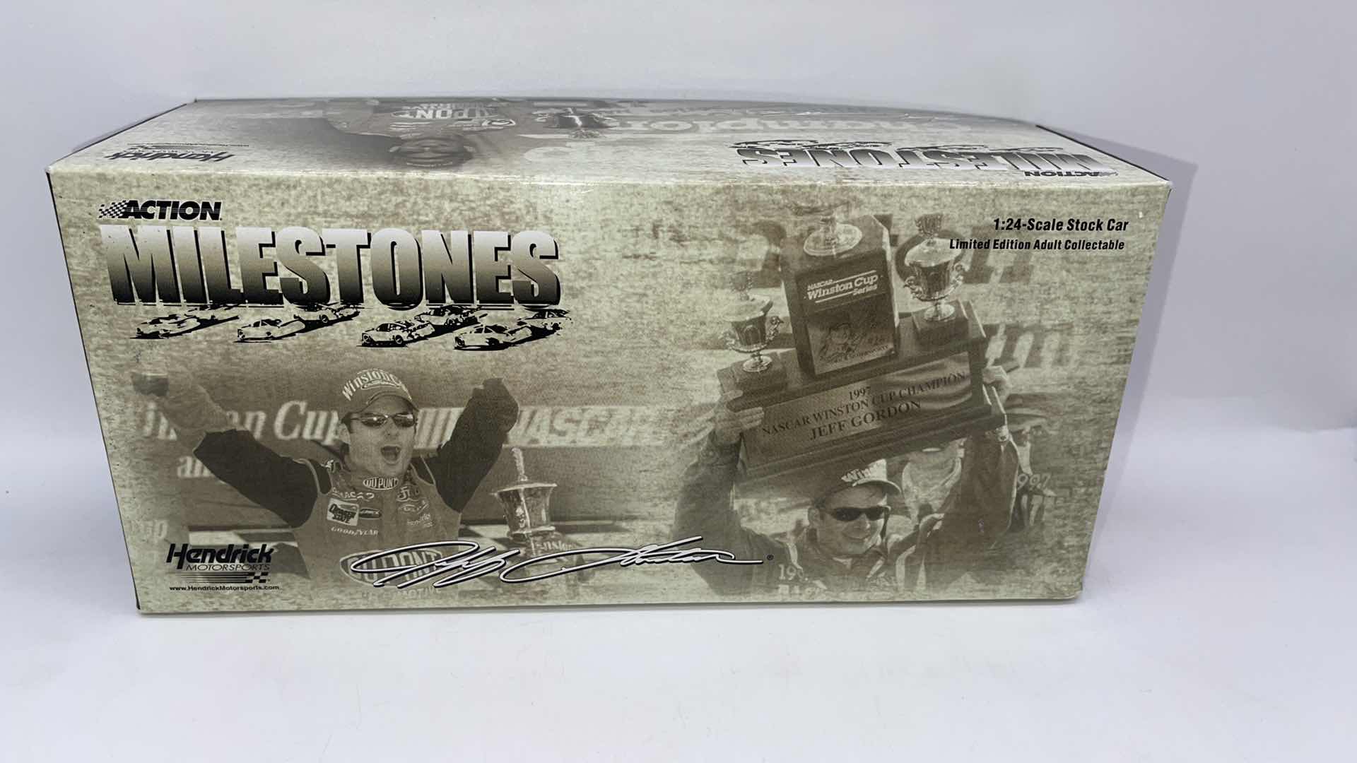 Photo 1 of 2005 JEFF GORDAN #24 ACTION MILESTONES 4X INDY 400 WINNER DIECAST CAR 1:18