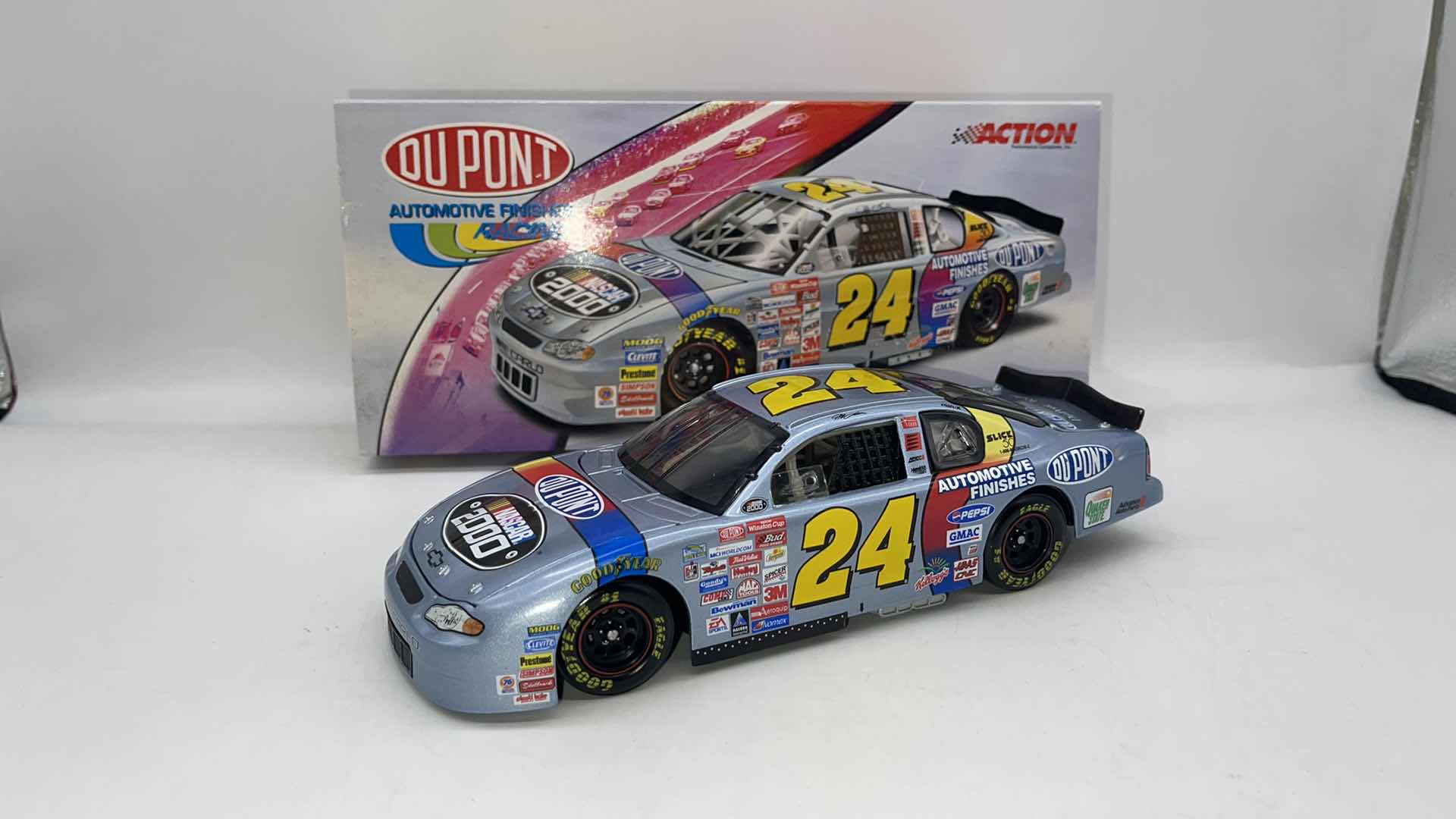 Photo 1 of RARE 2000 JEFF GORDAN #24 DUPONT SILVER NASCAR DIECAST CAR 1:24