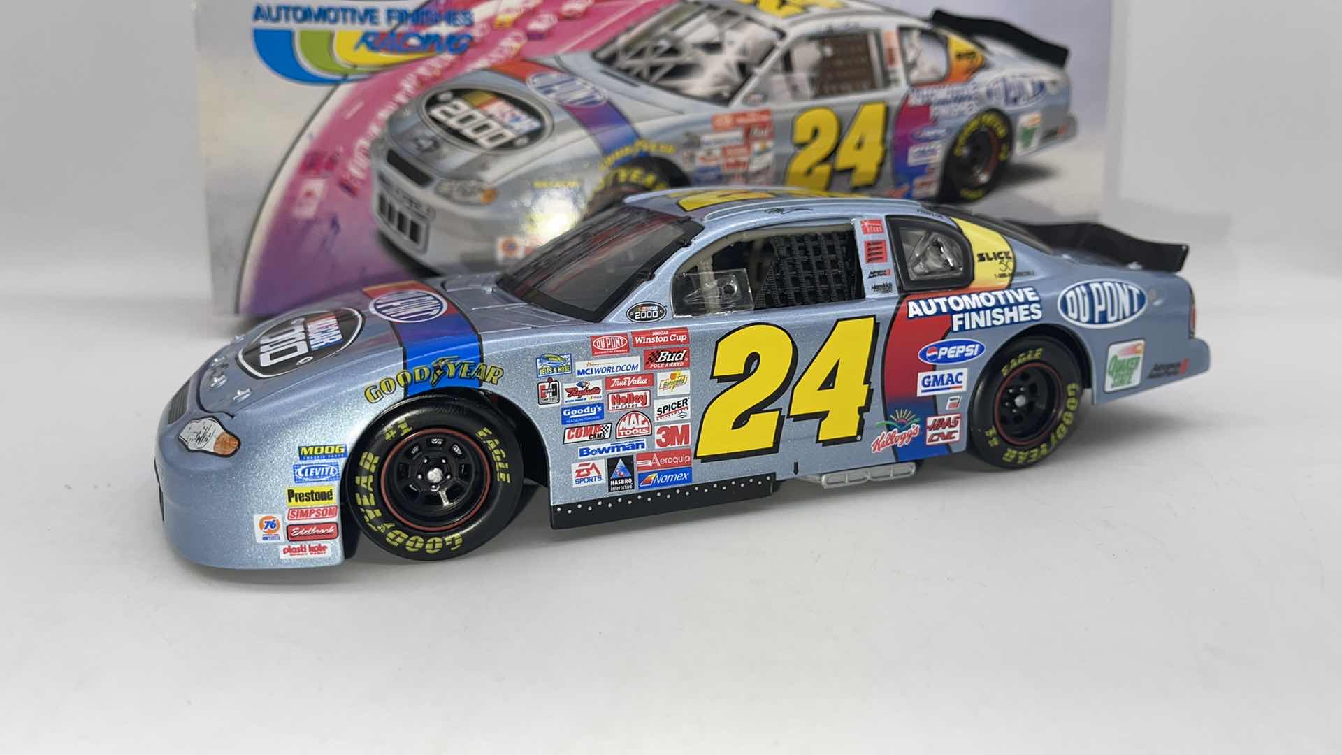 Photo 1 of RARE 2000 JEFF GORDAN #24 DUPONT SILVER NASCAR DIECAST CAR 1:24