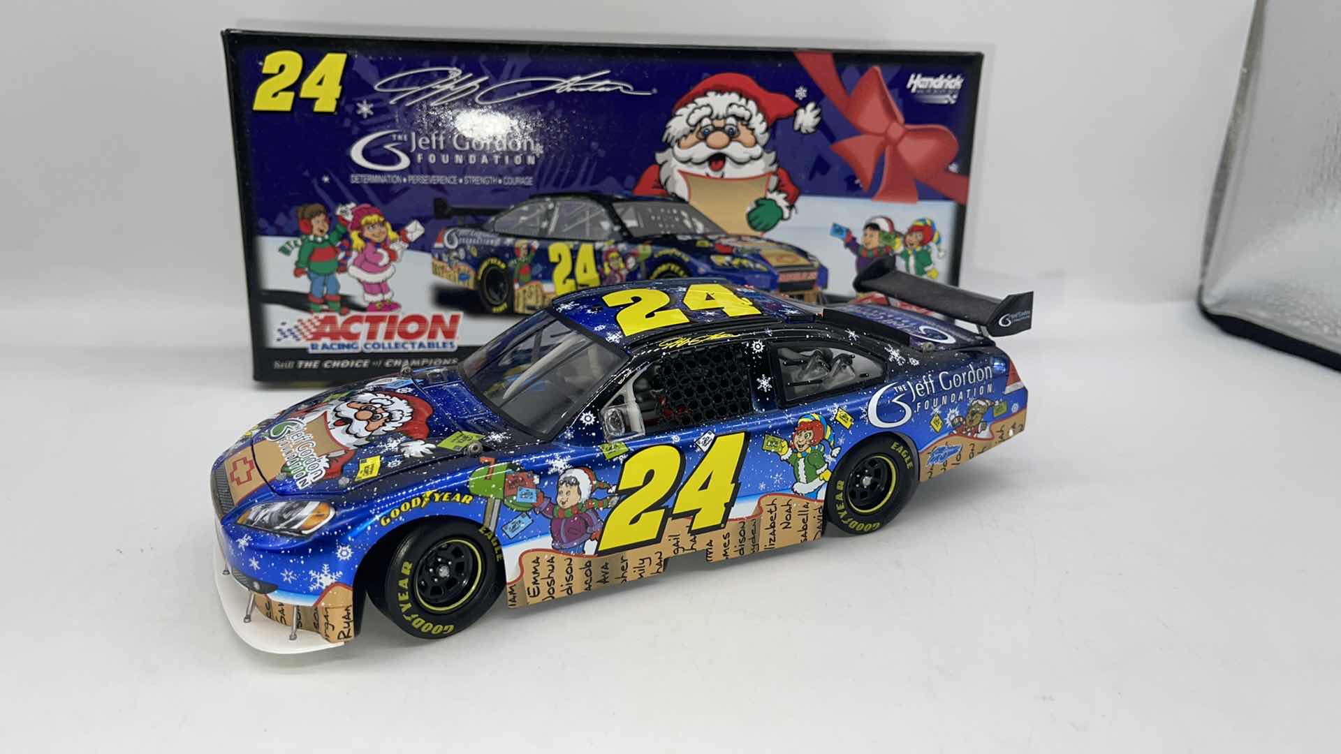 Photo 1 of RARE 2009 JEFF GORDON FOUNDATION HOLIDAY SAM BASS DIECAST IMPALA SS ELIGE LIQUID COLOR 1:24
