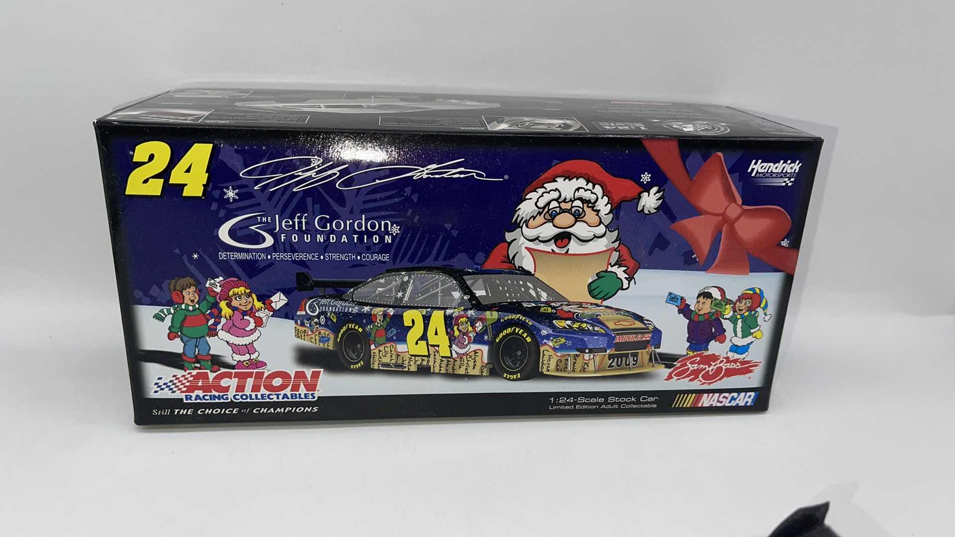Photo 1 of RARE 2009 JEFF GORDON FOUNDATION HOLIDAY SAM BASS DIECAST IMPALA SS ELIGE LIQUID COLOR 1:24