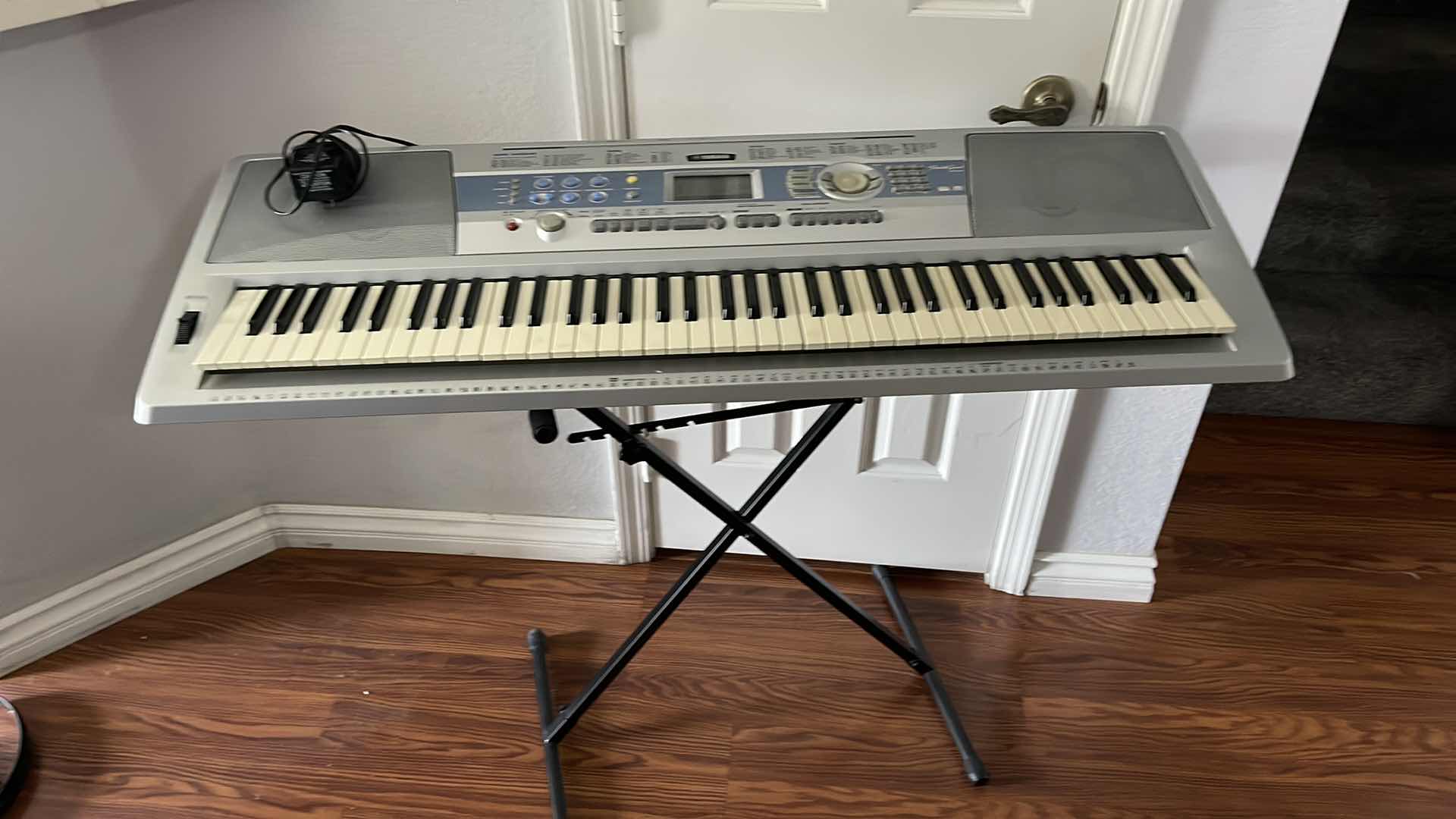 Photo 1 of YAMAHANA PORTABLE GRAND PIANO W STAND MODEL DGX-200