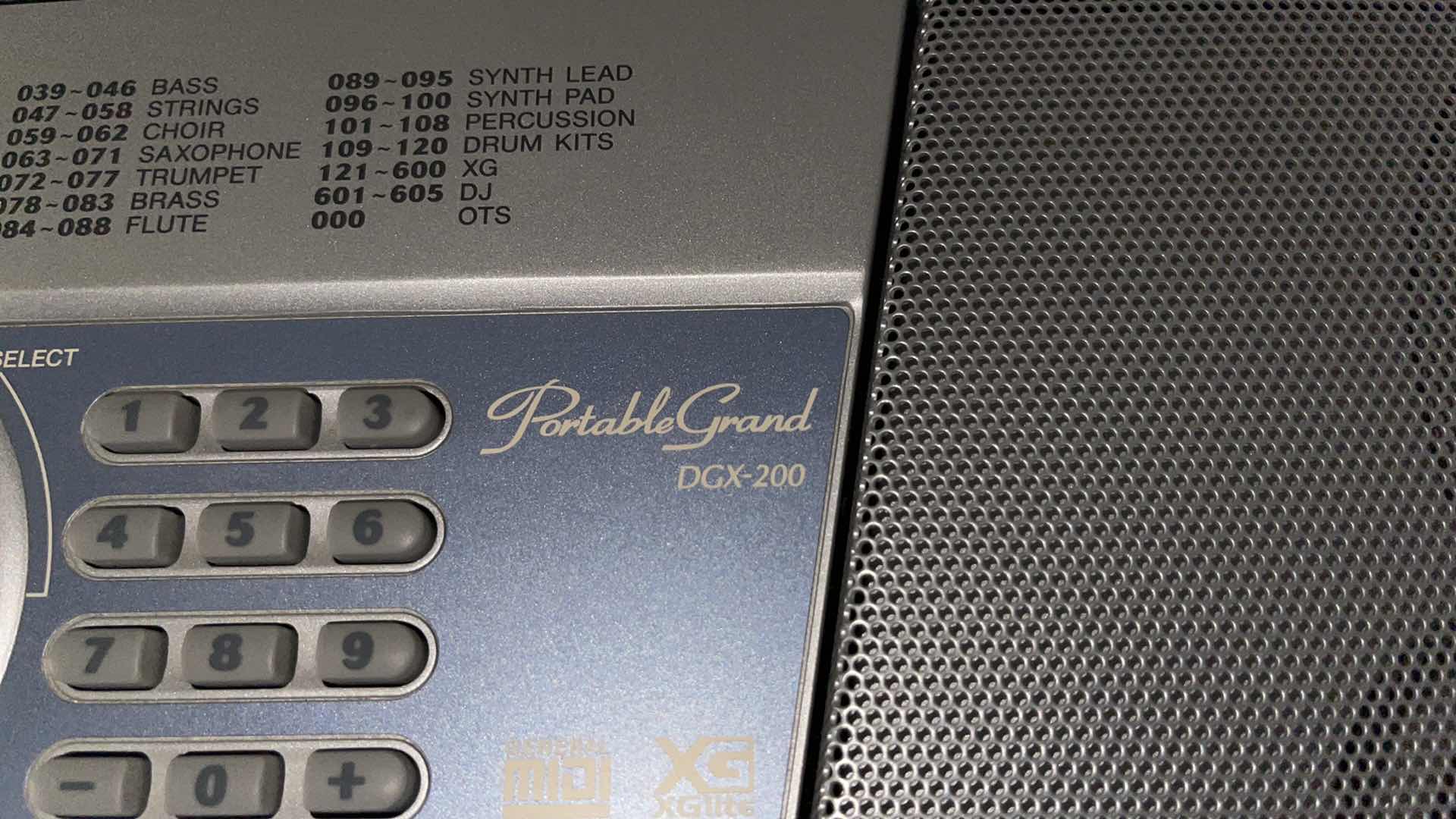 Photo 1 of YAMAHANA PORTABLE GRAND PIANO W STAND MODEL DGX-200