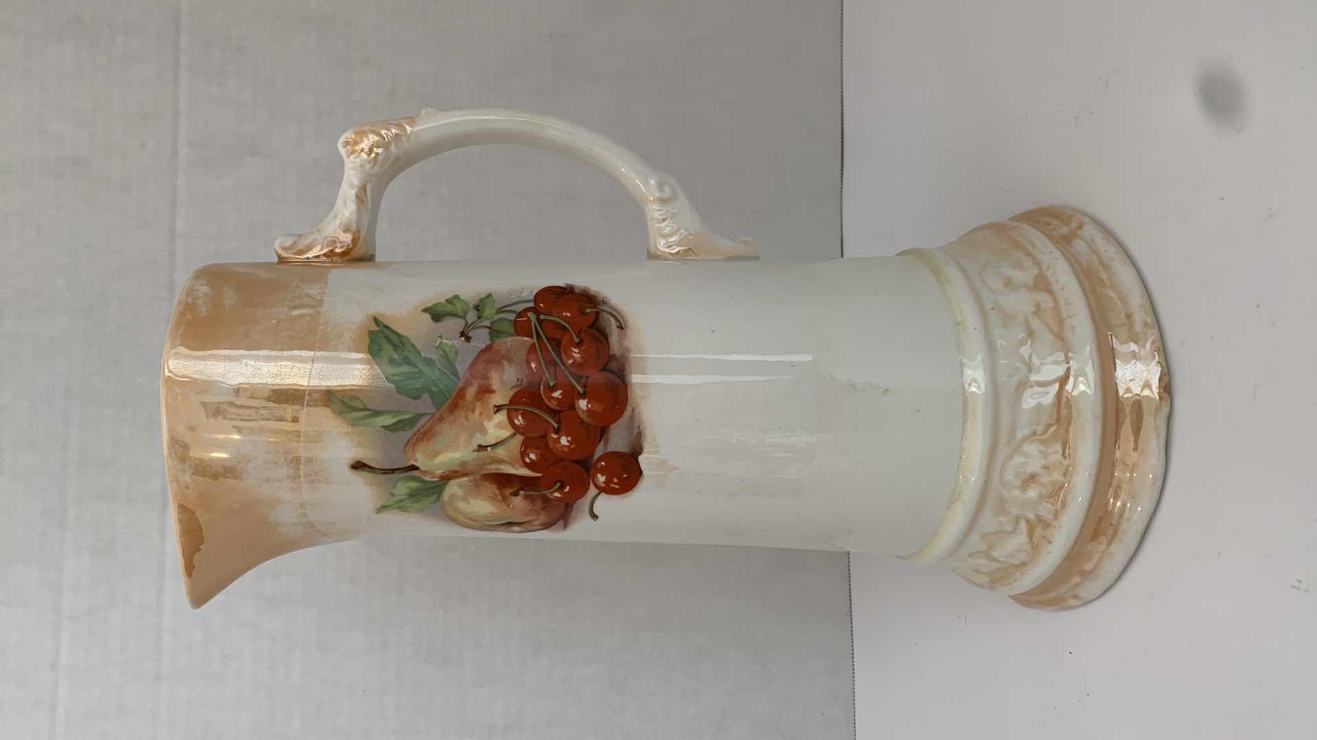 View 1 of RARE VINTAGE ETRUIA MELLOR & CO CHERRY PITCHER RETAIL H 12”