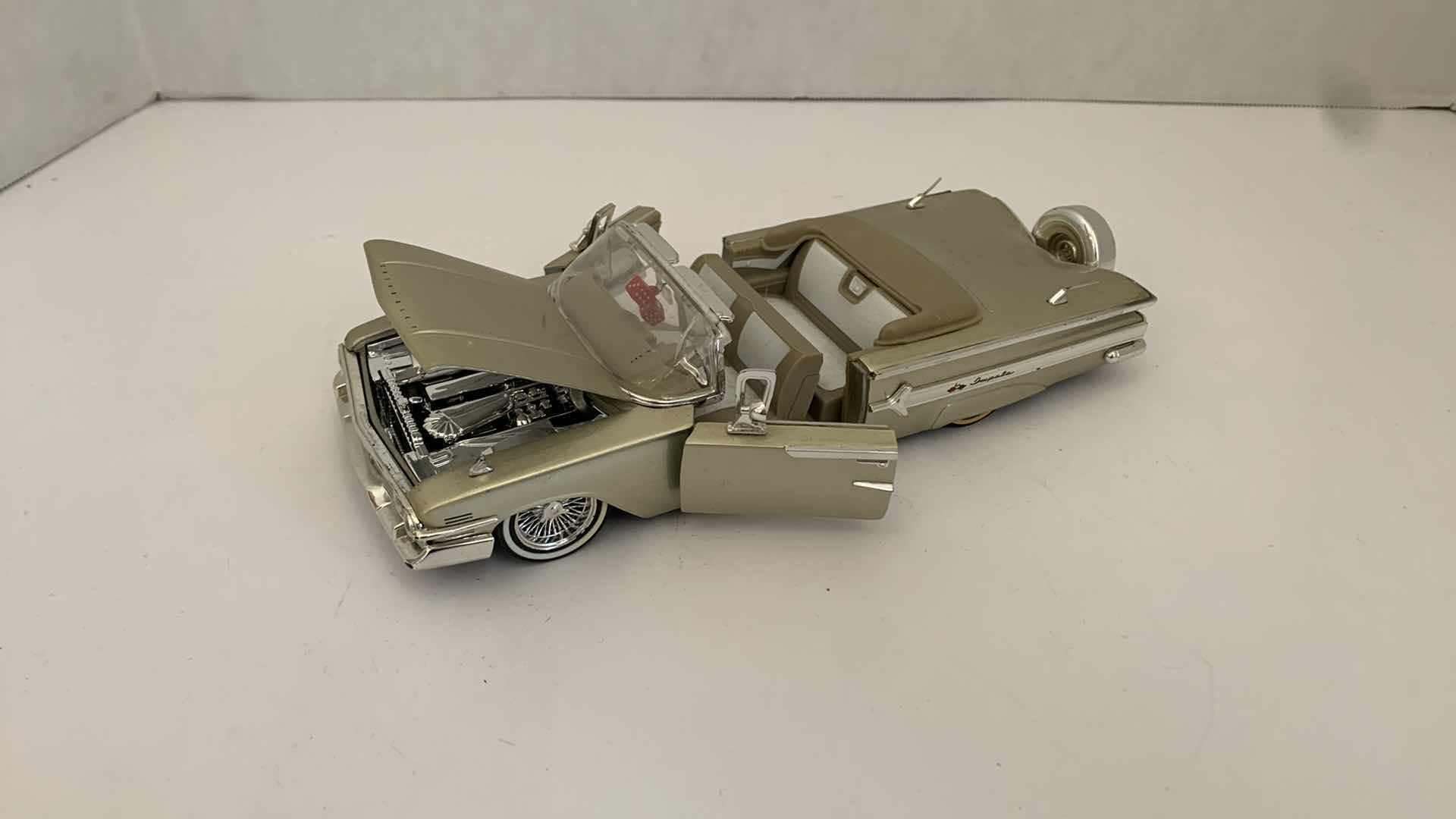 Photo 1 of DIE CAST METAL 1960 CHEVORLET IMPALA 9” X 3” H 2.5”