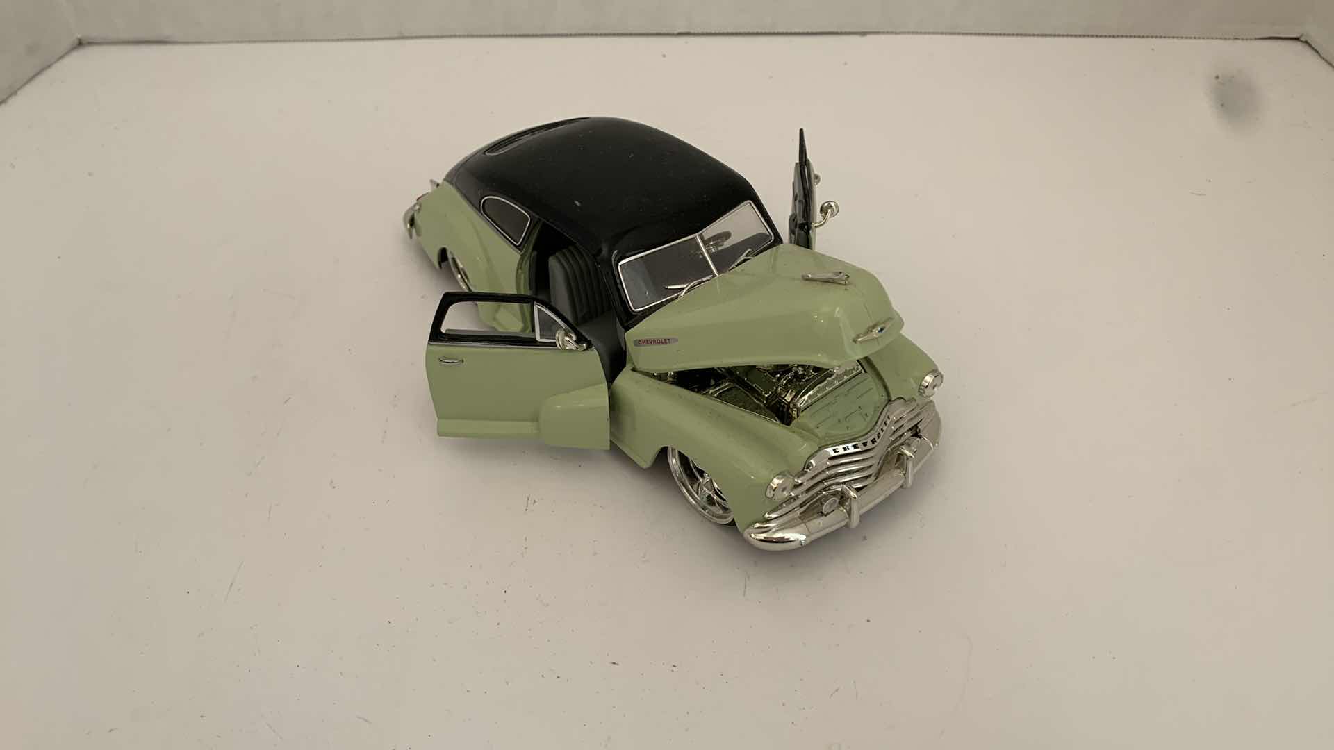 View 2 of DIE CAST METAL 1947 CHEVORLET AEROSEDAN FLEETLINE 8” X 3” H 2”