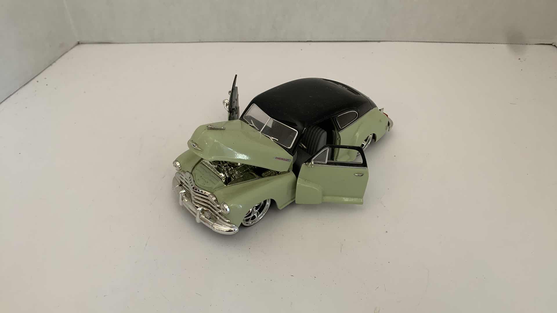View 1 of DIE CAST METAL 1947 CHEVORLET AEROSEDAN FLEETLINE 8” X 3” H 2”