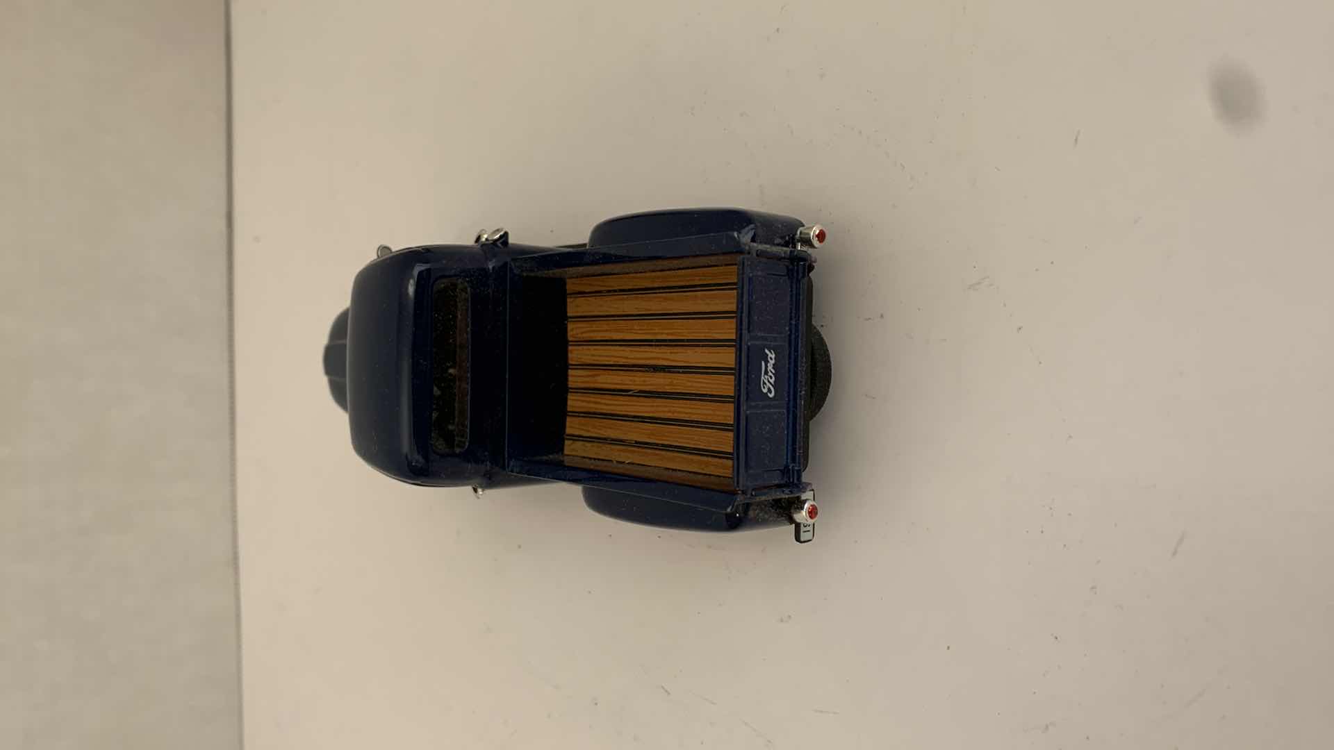 Photo 1 of SET OF 4 DIE CAST METAL FORD AND CHEVORLET TRUCKS 6” X 2” H 3”