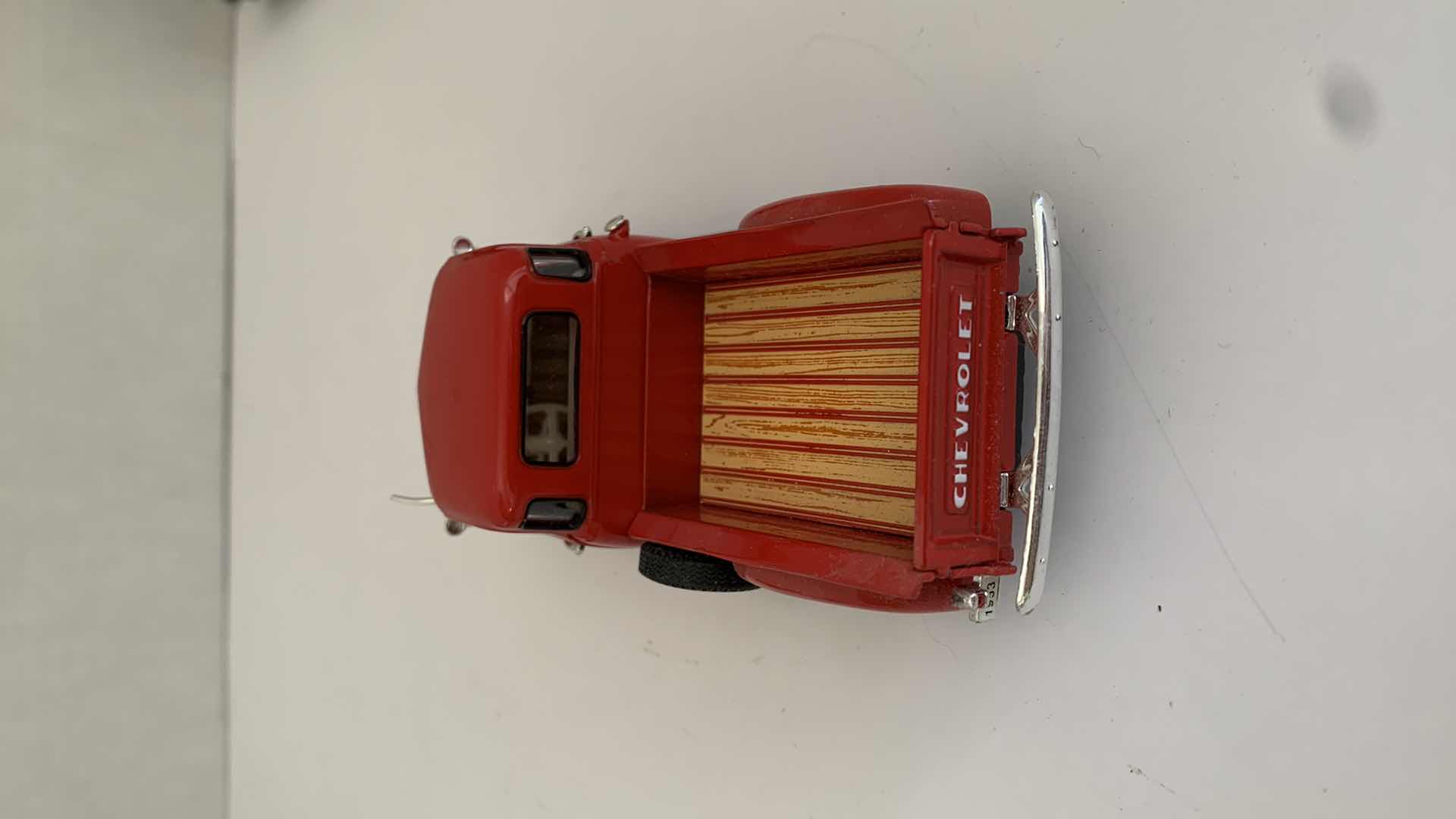 Photo 1 of SET OF 4 DIE CAST METAL FORD AND CHEVORLET TRUCKS 6” X 2” H 3”