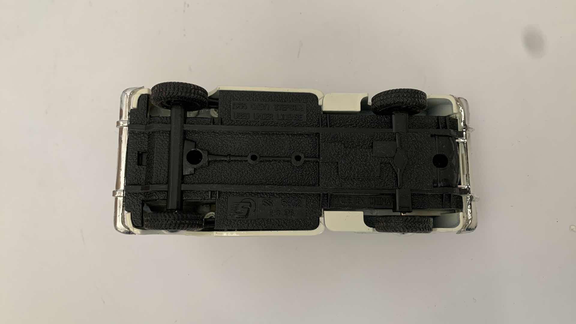 Photo 1 of SET OF 4 DIE CAST METAL FORD AND CHEVORLET TRUCKS 6” X 2” H 3”