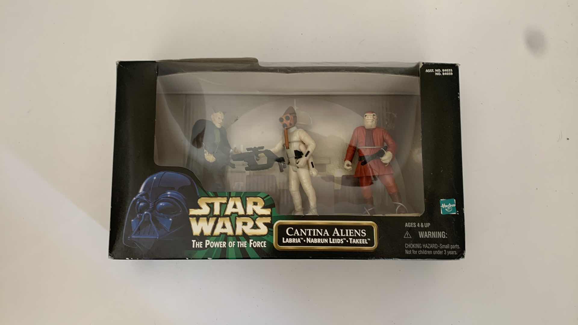 Photo 1 of SET OF 4 STAR WARS FIGURES IN BOX