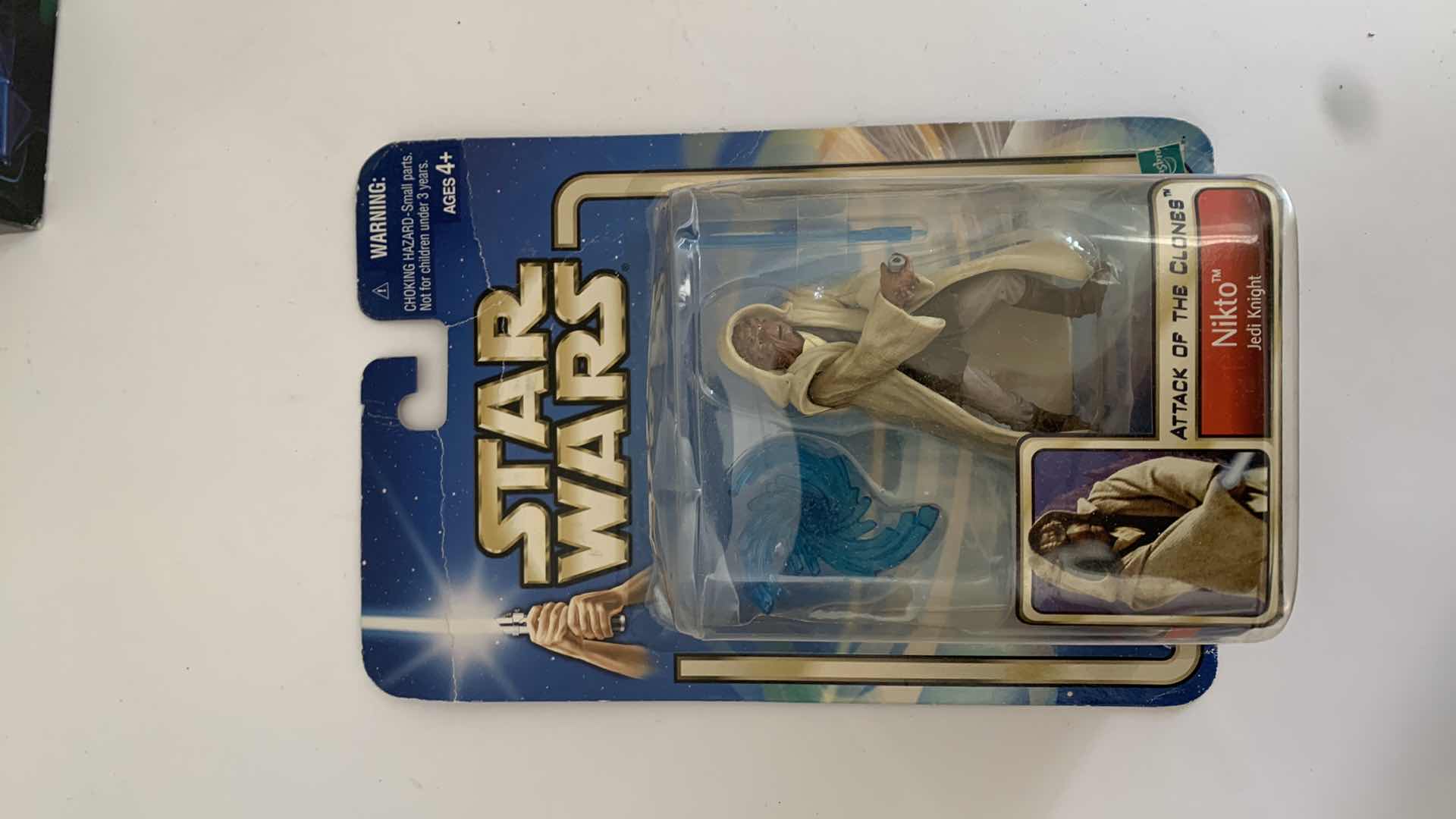 Photo 1 of SET OF 4 STAR WARS FIGURES IN BOX