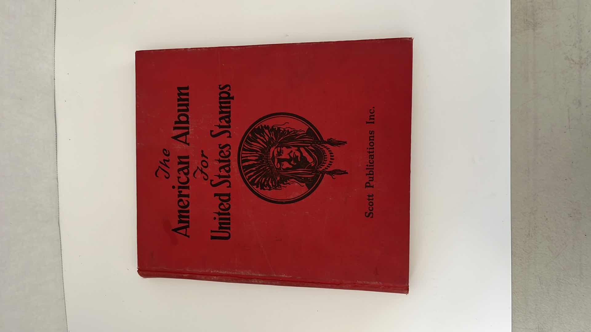 Photo 1 of AMERICAN ALBUM CONTAINING VINTAGE STAMPS