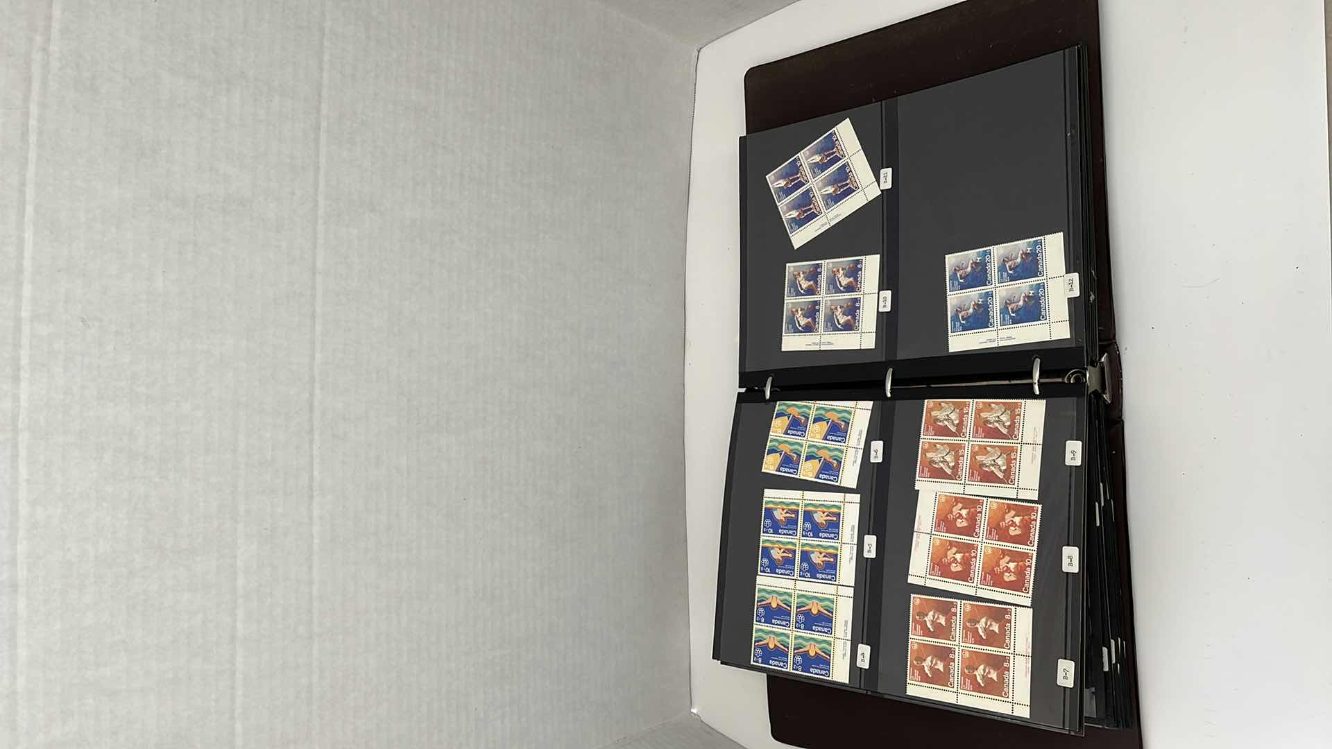 Photo 1 of CANADIAN ALBUM CONTAINING VINTAGE STAMPS