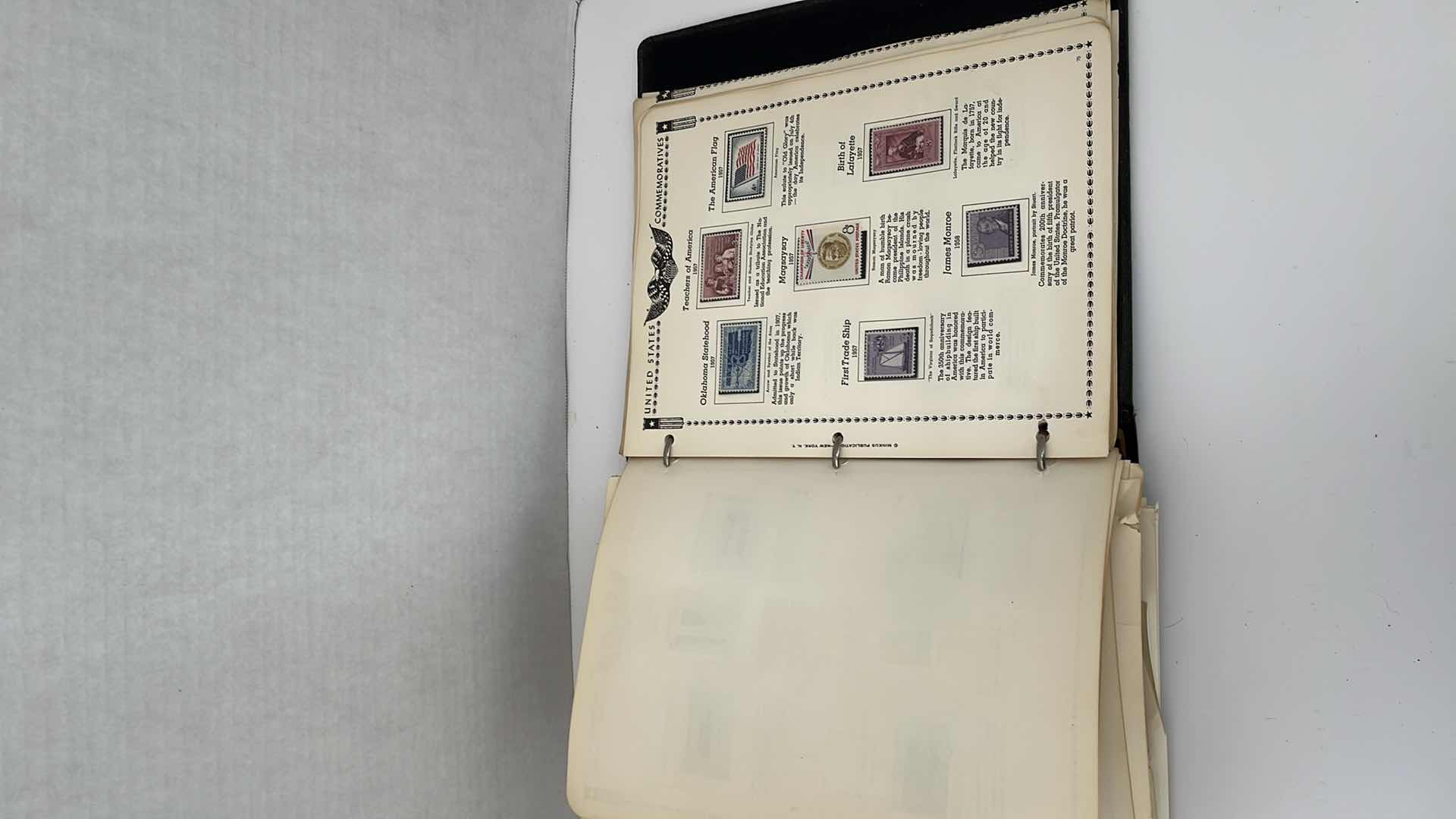 Photo 1 of UNITED STATES VINTAGE STAMP ALBUM