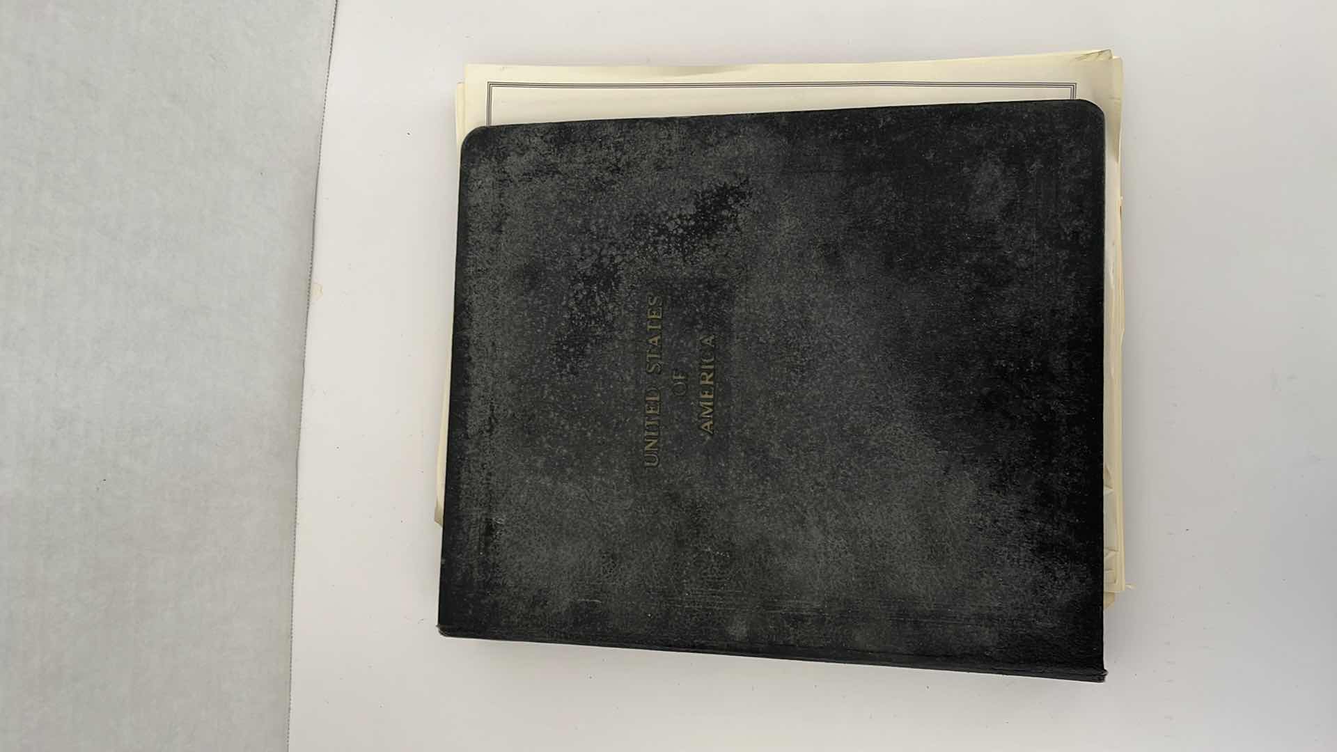 Photo 1 of UNITED STATES VINTAGE STAMP ALBUM