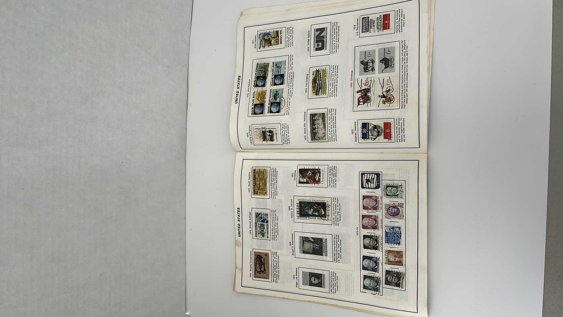 Photo 1 of UNITED STATES VINTAGE STAMP ALBUM