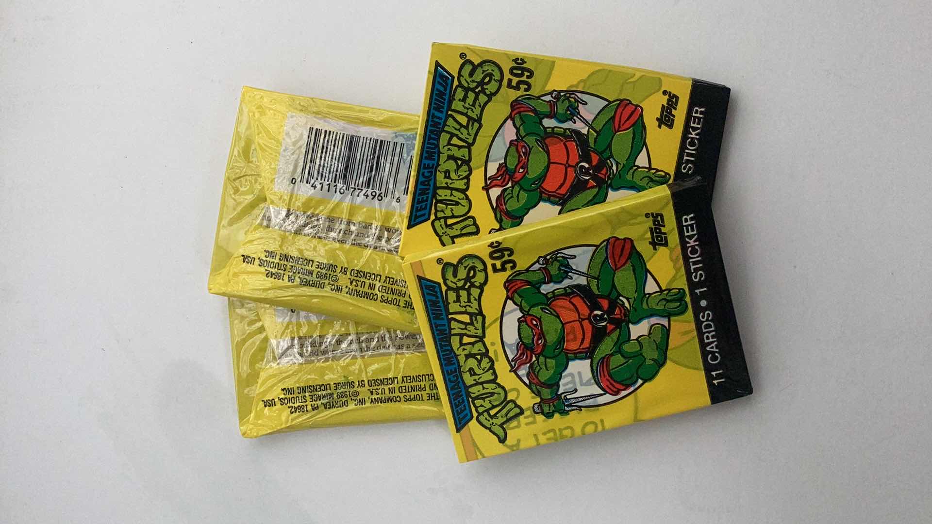 Photo 1 of SET OF 4 1989 TEENAGE MUTANT NINJA TURTLES CARD PACK