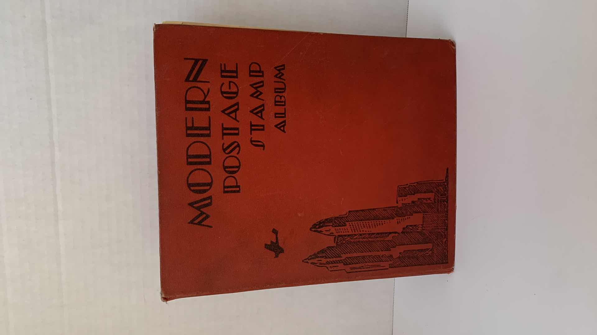 Photo 1 of MODERN POSTAGE STAMP ALBUM