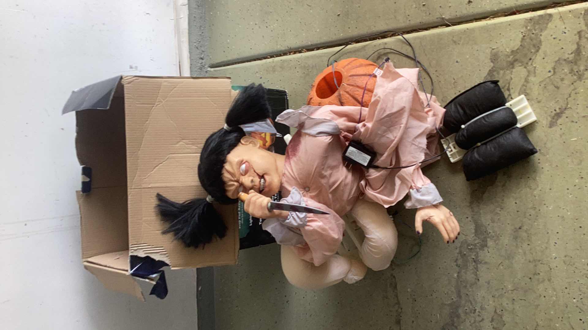 Photo 1 of SPIRIT HALLOWEEN LUNGING PUMPKIN CARVER