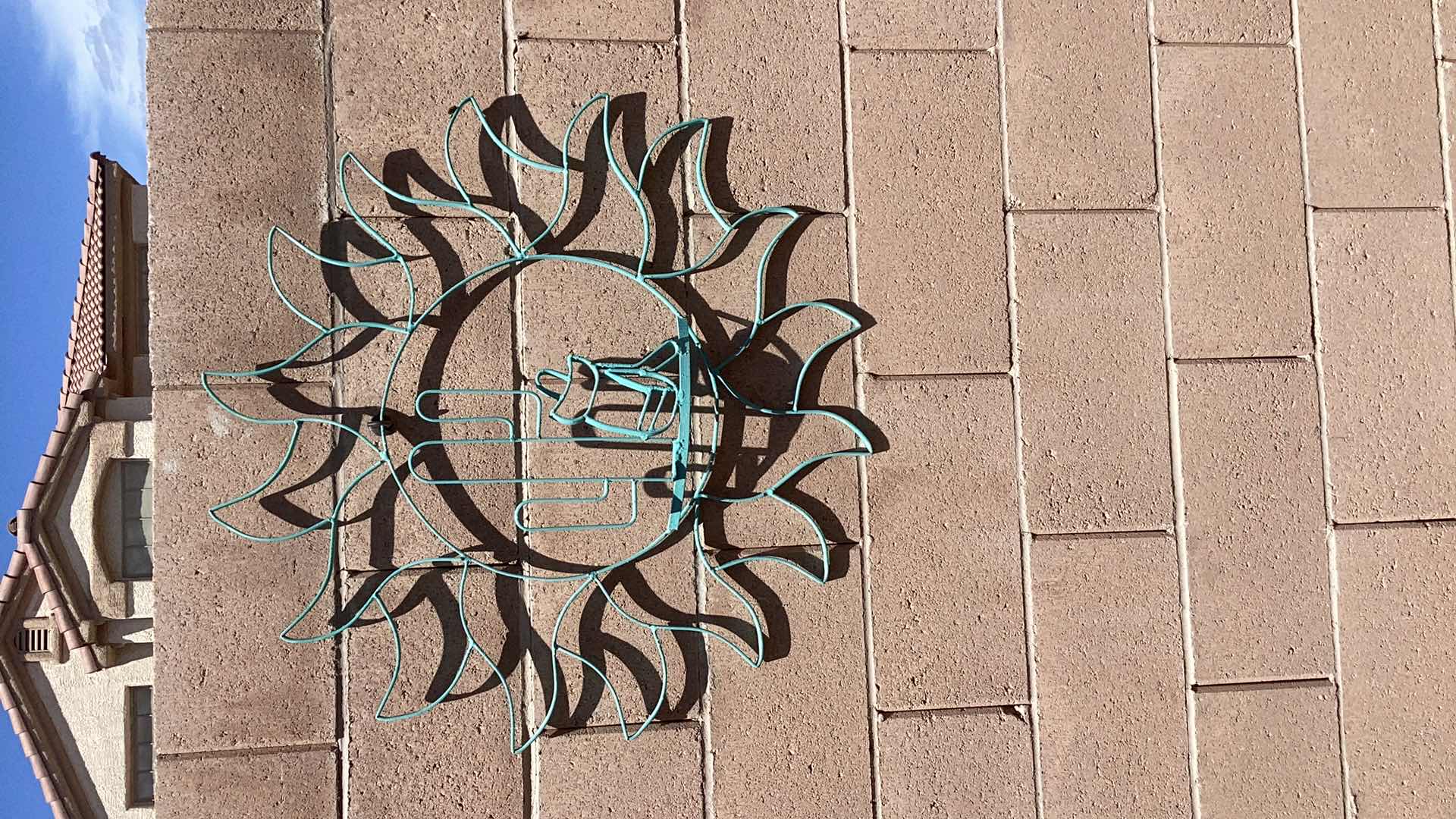 Photo 1 of PAIR OF SOUTHWESTERN INSPIRED METAL WALL HANGINGS 29” WIDE