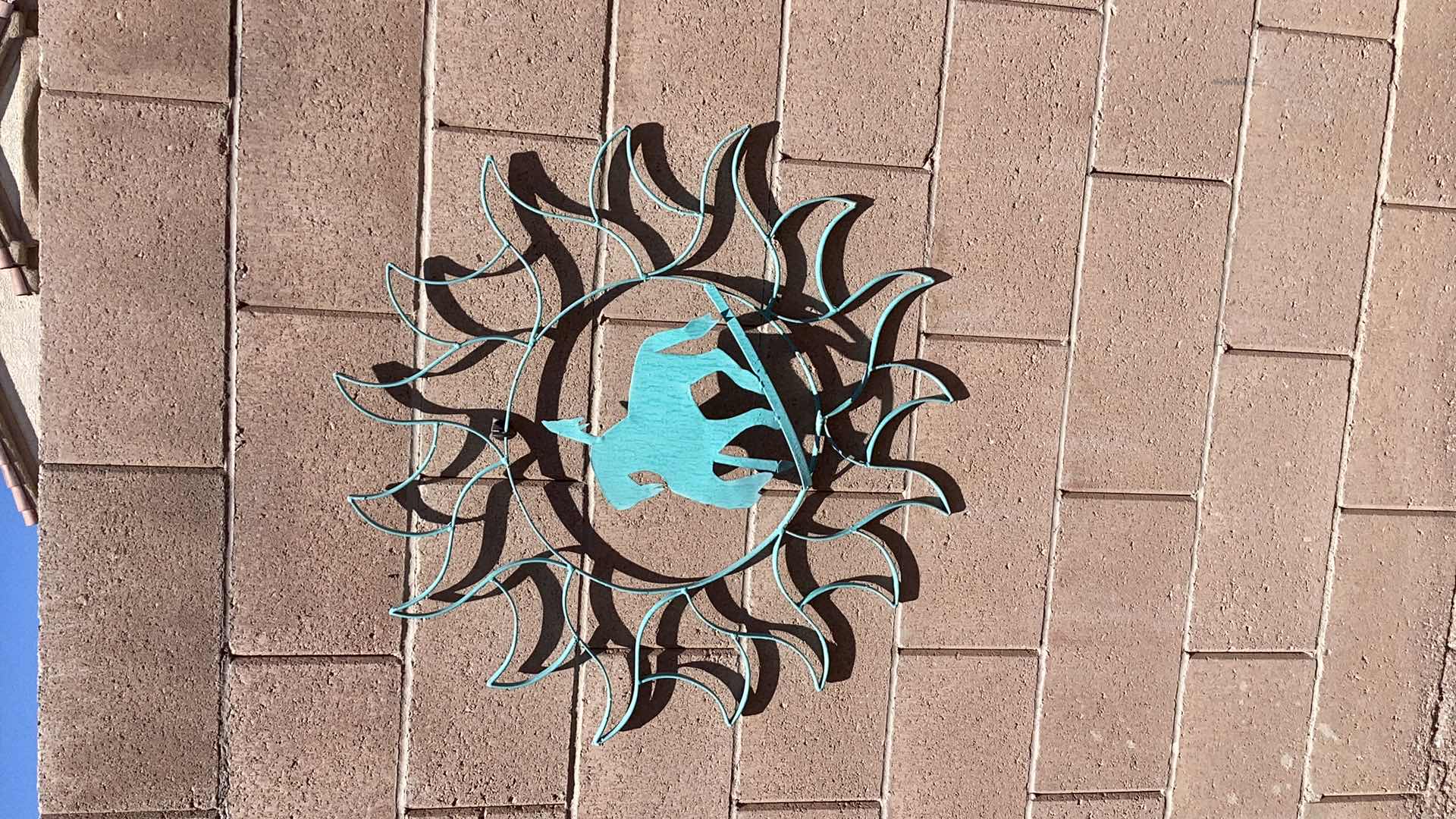 Photo 1 of PAIR OF SOUTHWESTERN INSPIRED METAL WALL HANGINGS 29” WIDE