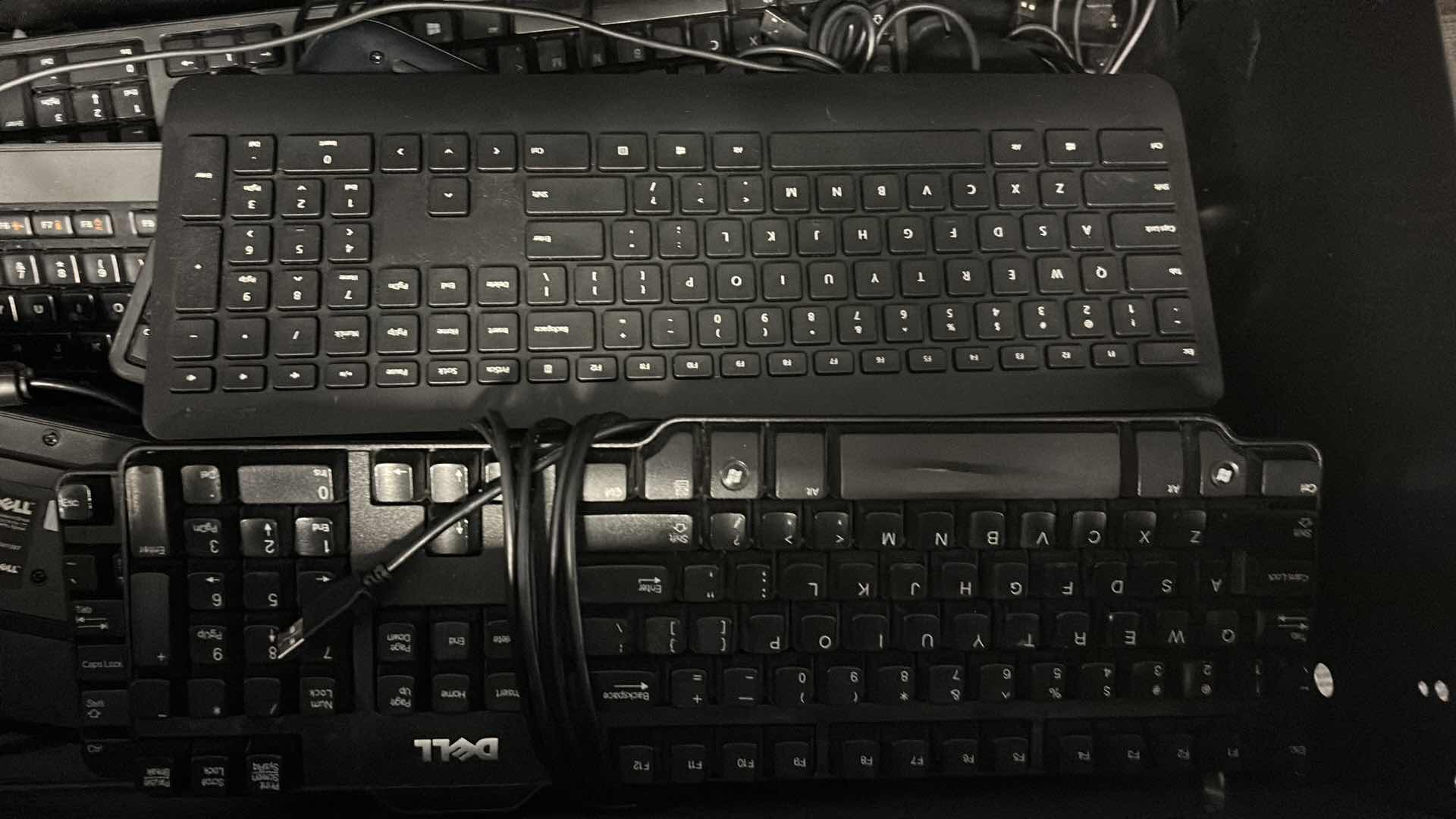 Photo 1 of CONTENTS OF CABINET DRAWER -  KEYBOARDS