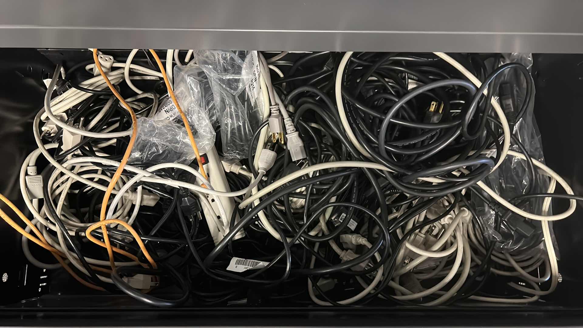 Photo 1 of CONTENTS OF CABINET DRAWER