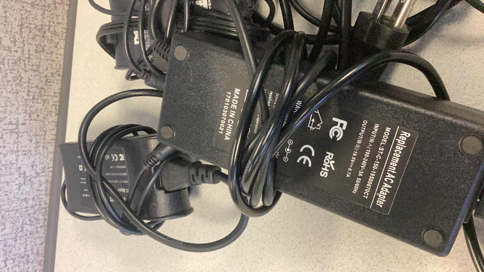 Photo 1 of FIVE LAPTOP CHARGERS