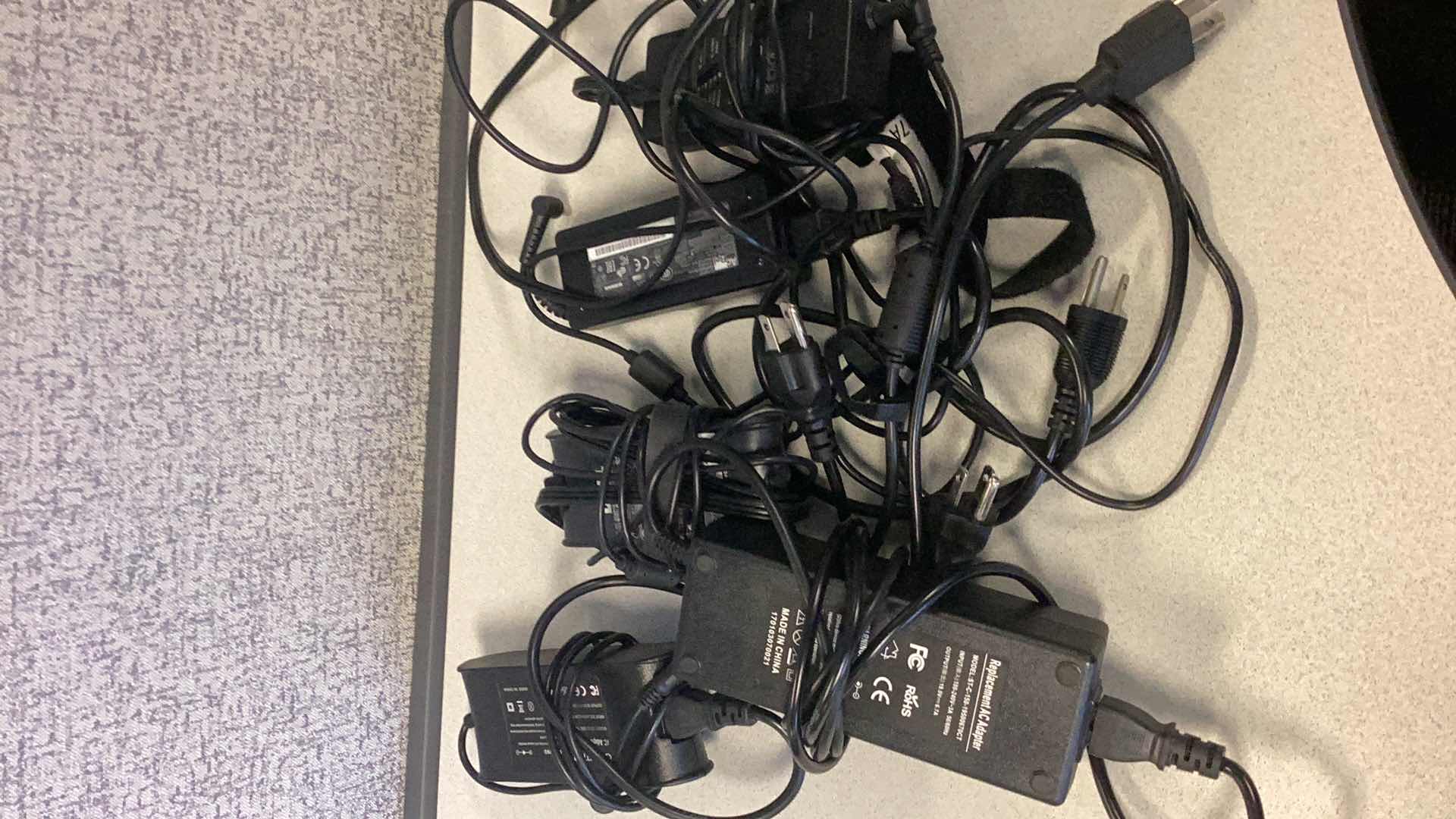 Photo 1 of FIVE LAPTOP CHARGERS