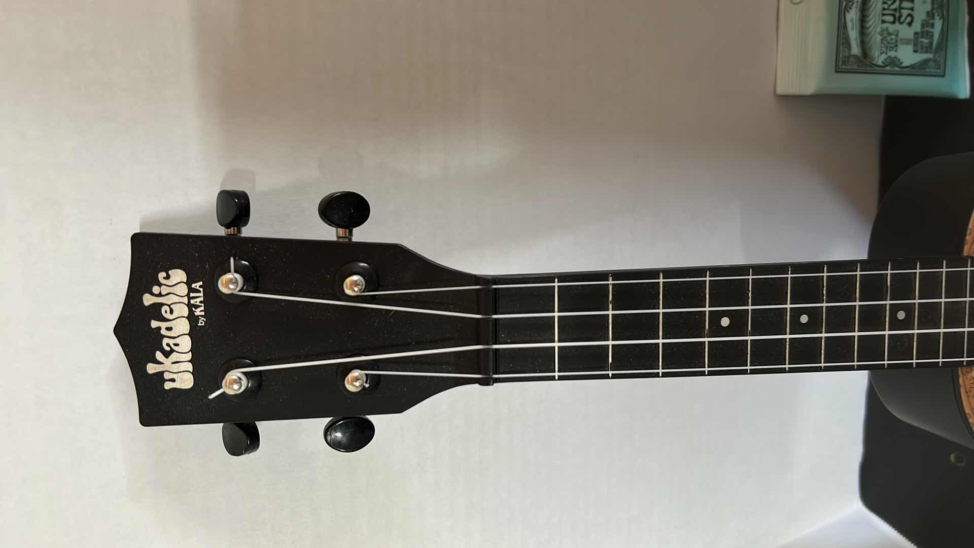 Photo 1 of UKELE AND NEW STRINGS