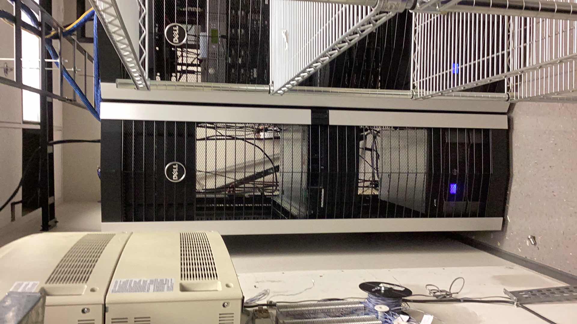 Photo 1 of DELL SERVER RACK 24” X 36” H 79” COMPONENTS NOT INCLUDED  (BUYER TO DISASSEMBLE & REMOVE FROM 2ND STORY OFFICE BUILDING W ELEVATOR)