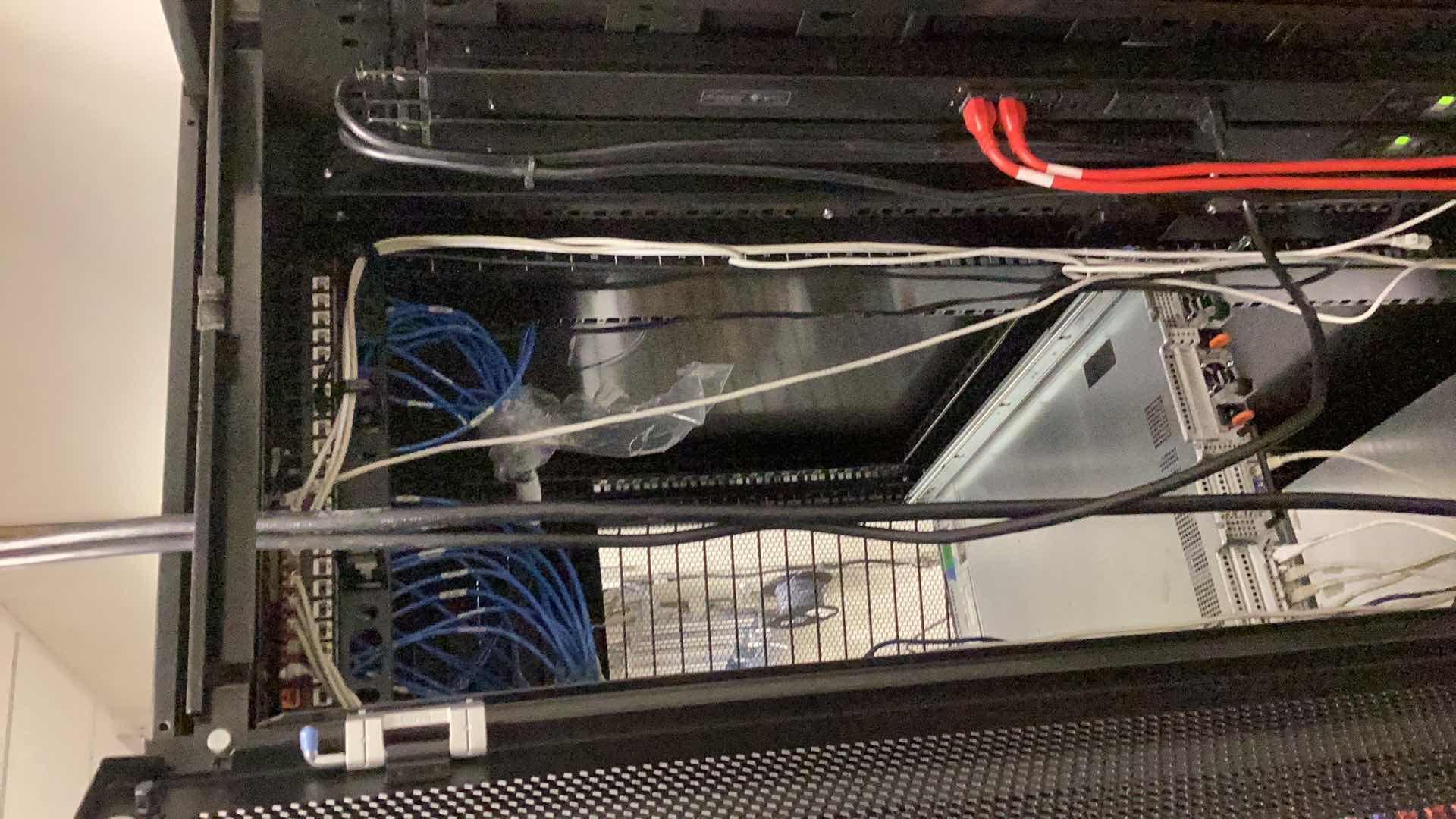 Photo 1 of DELL SERVER RACK 24” X 36” H 79” COMPONENTS NOT INCLUDED  (BUYER TO DISASSEMBLE & REMOVE FROM 2ND STORY OFFICE BUILDING W ELEVATOR)