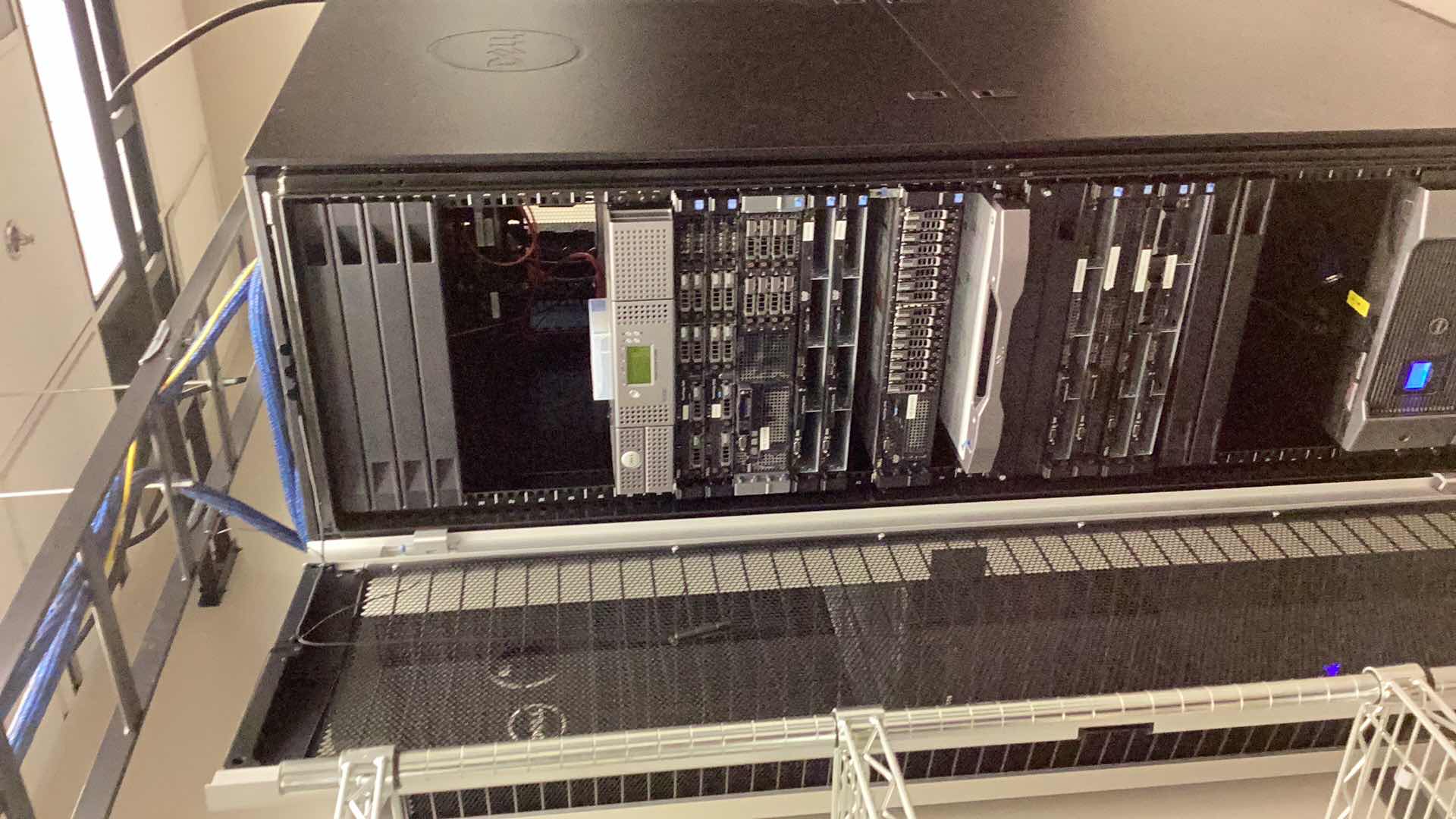 Photo 1 of DELL SERVER RACK WITH PULL OUT CONFIGURATION TRAY 24” X 36” H 79” COMPONENTS NOT INCLUDED  (BUYER TO DISASSEMBLE & REMOVE FROM 2ND STORY OFFICE BUILDING W ELEVATOR)