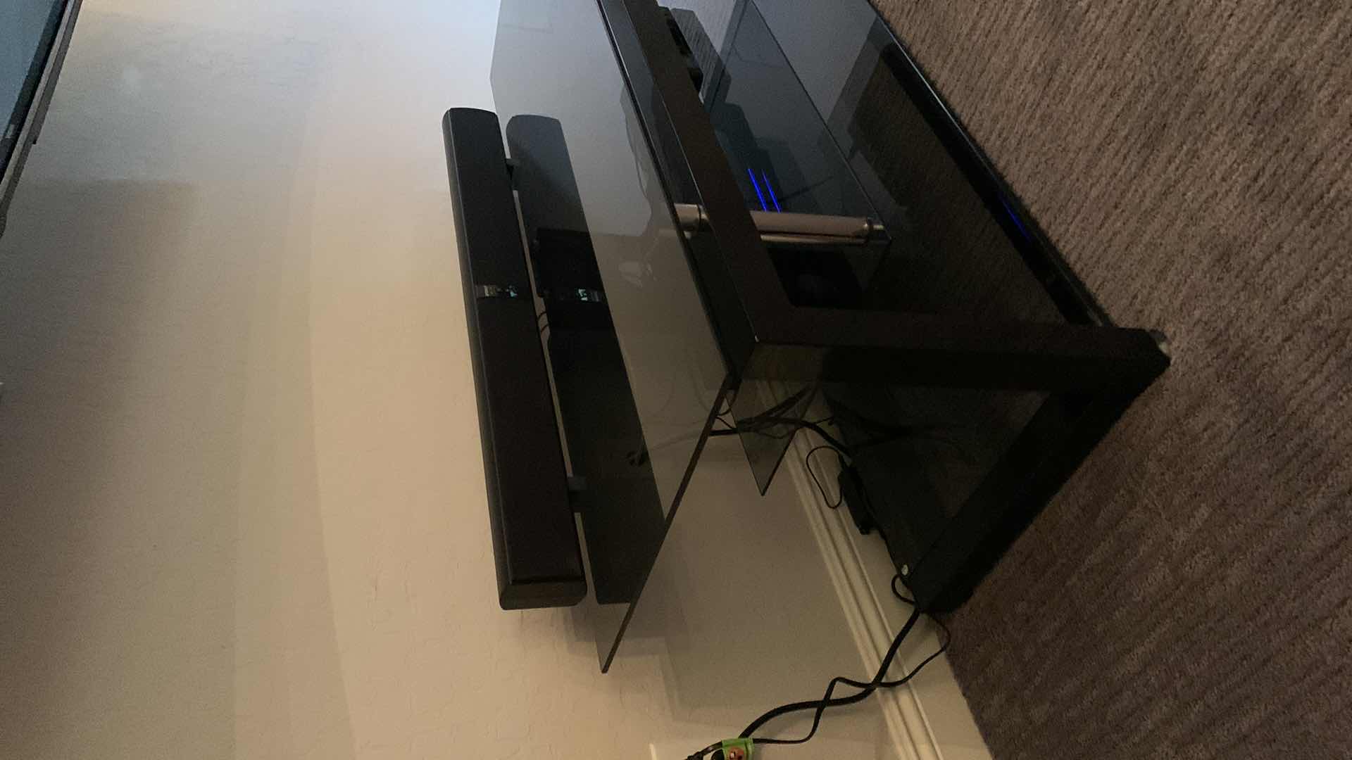 Photo 1 of BLACK TEMPERED SMOKED GLASS W CHROME ENTERTAINMENT CONSOLE (ELECTRONICS OR SOUNDBAR NOT INCLUDED) 52” x 20” x H20”