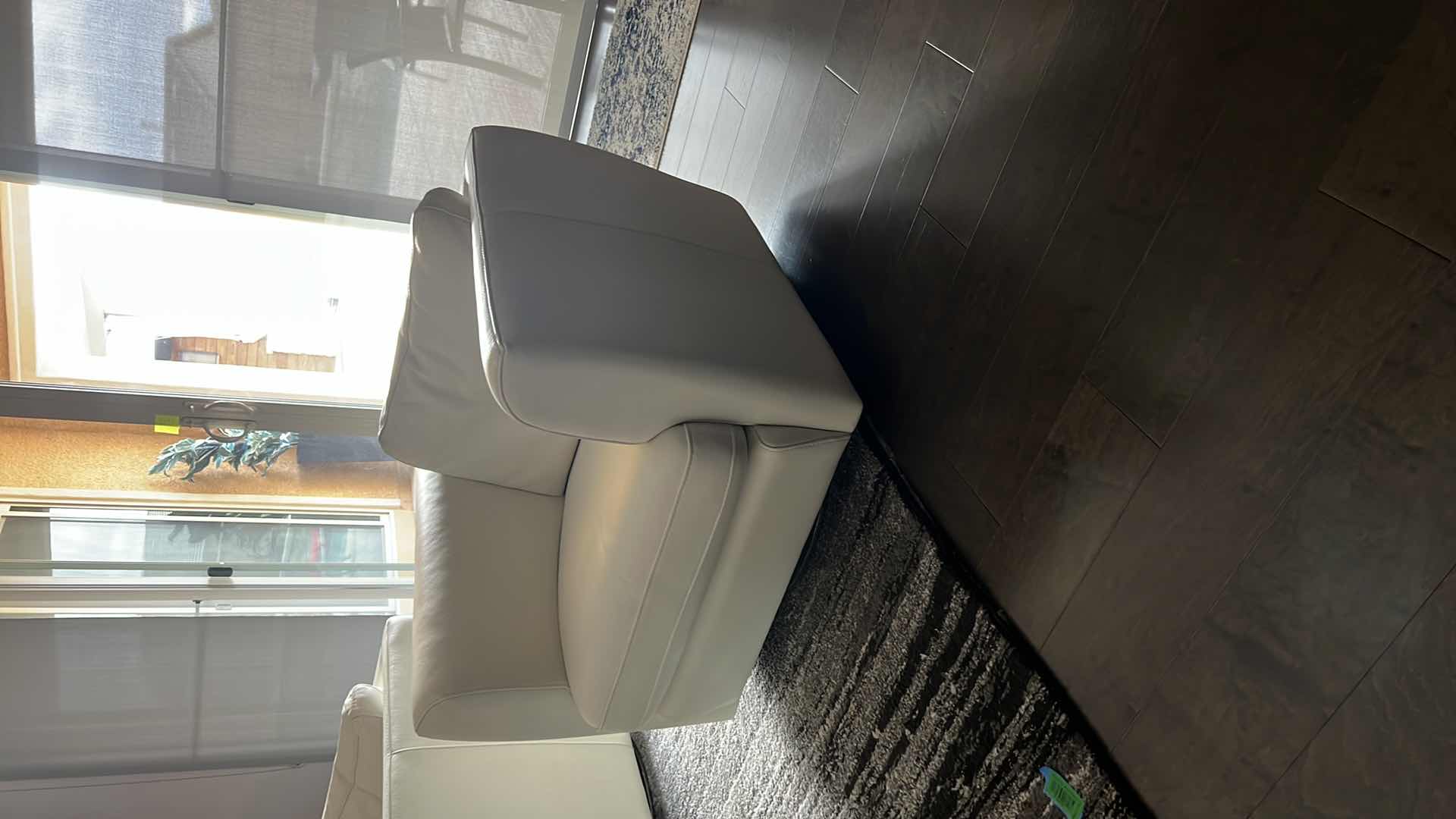 Photo 1 of ROCHE BOBOIS CREAM LEATHER SWIVEL ARM CHAIR