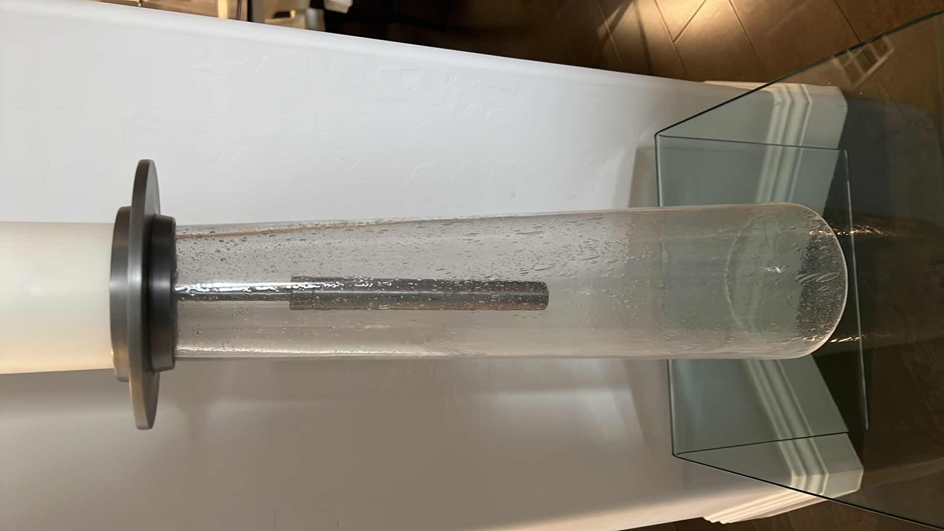 Photo 1 of GLOBAL VIEWS ELEGANT MINIMALIST SEEDED GLASS PILLAR CANDLE HOLDER H19" W CANDLE H34”