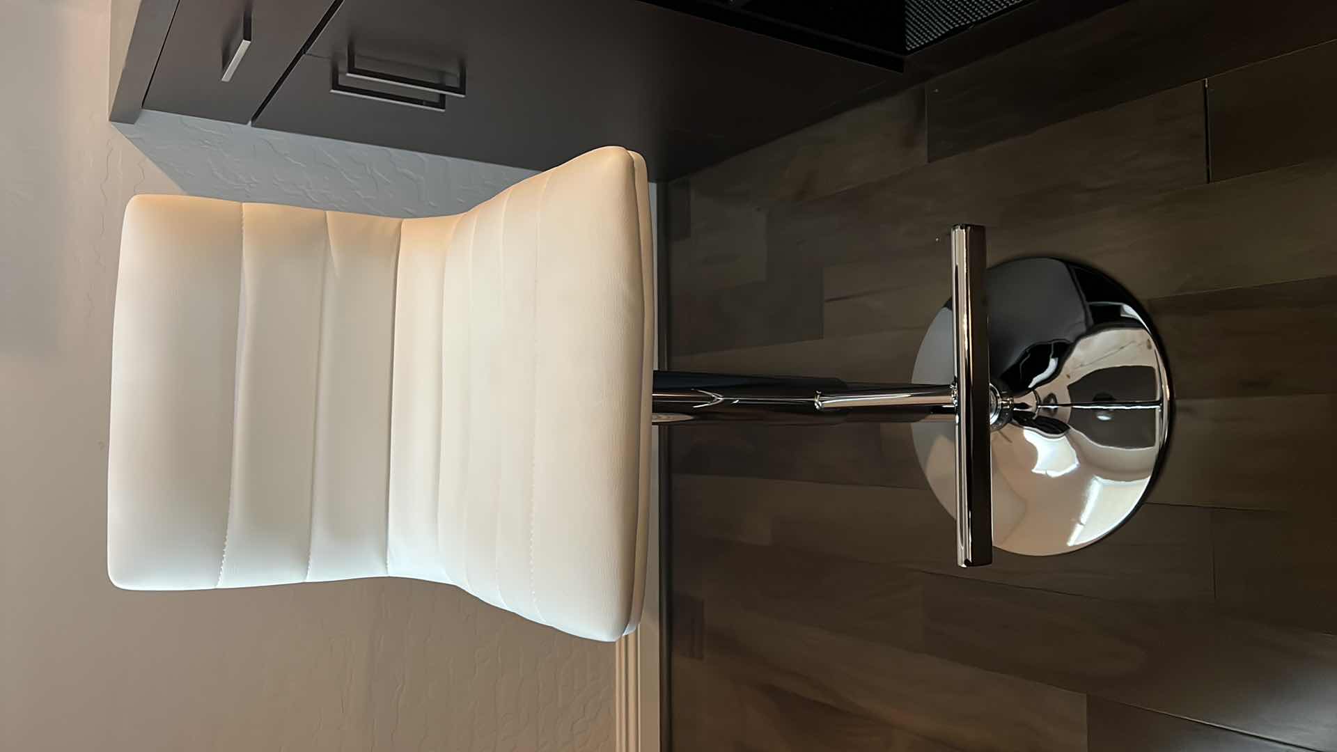 Photo 1 of DESIGNER WHITE LEATHER ADJUSTABLE ARMLESS SWIVEL UP AMD DOWN BAR STOOL W SILVER BASE