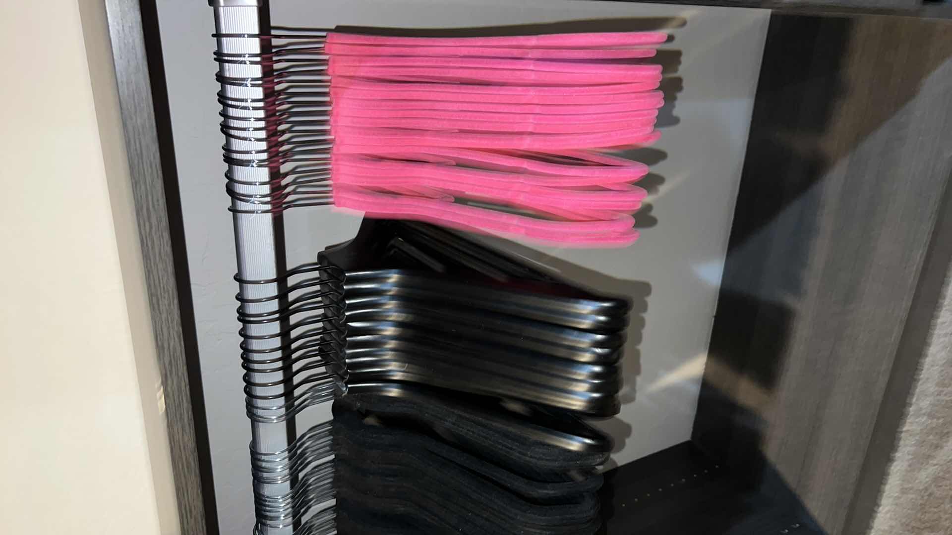 Photo 1 of ASSORTED CLOTHES HANGERS